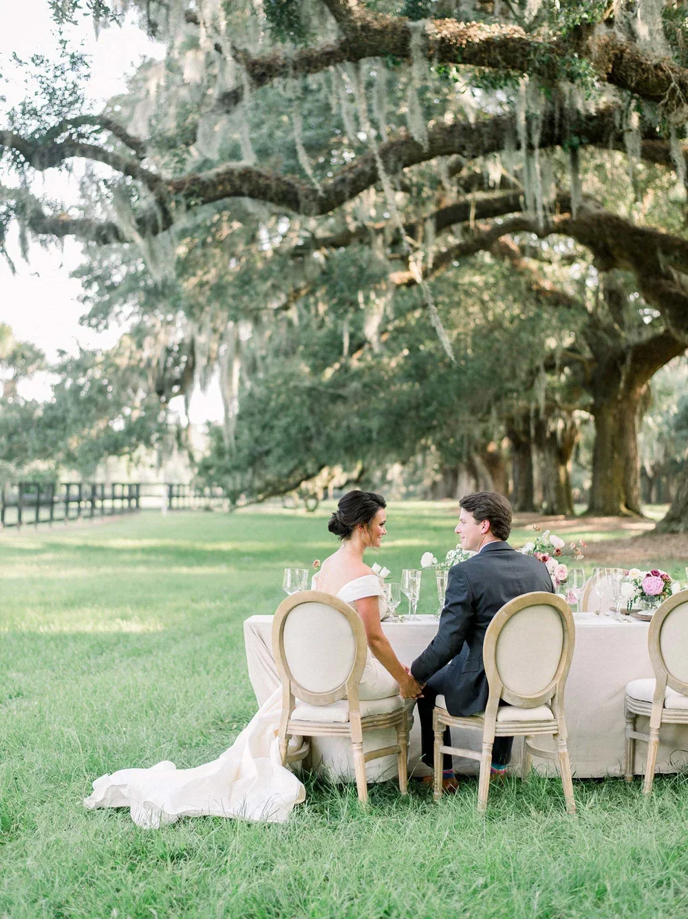 Bride and groom toasting in a Southern Wedding
