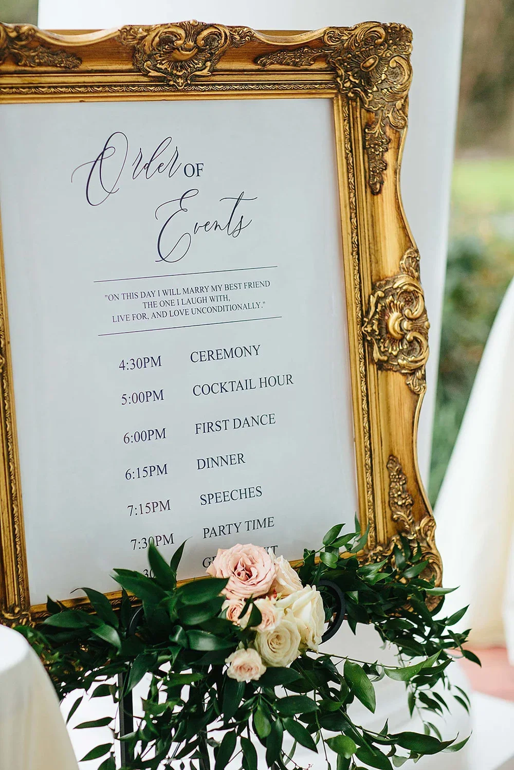 Wedding timeline sign with a gold frame