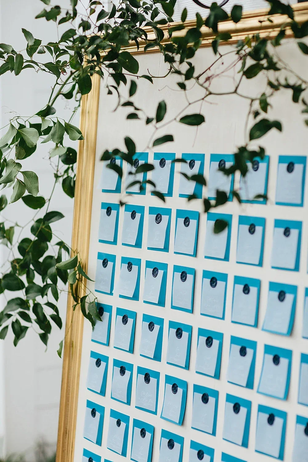 Navy wax seals and vellum paper seating chart