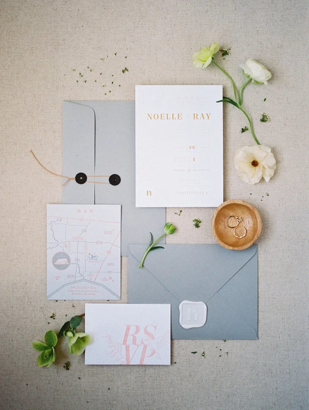 Wedding invitation with a grey envelope &amp; wood ring dish