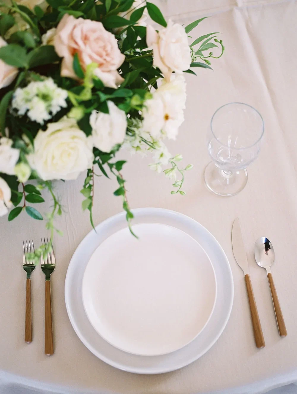 modern place setting with wood silverware