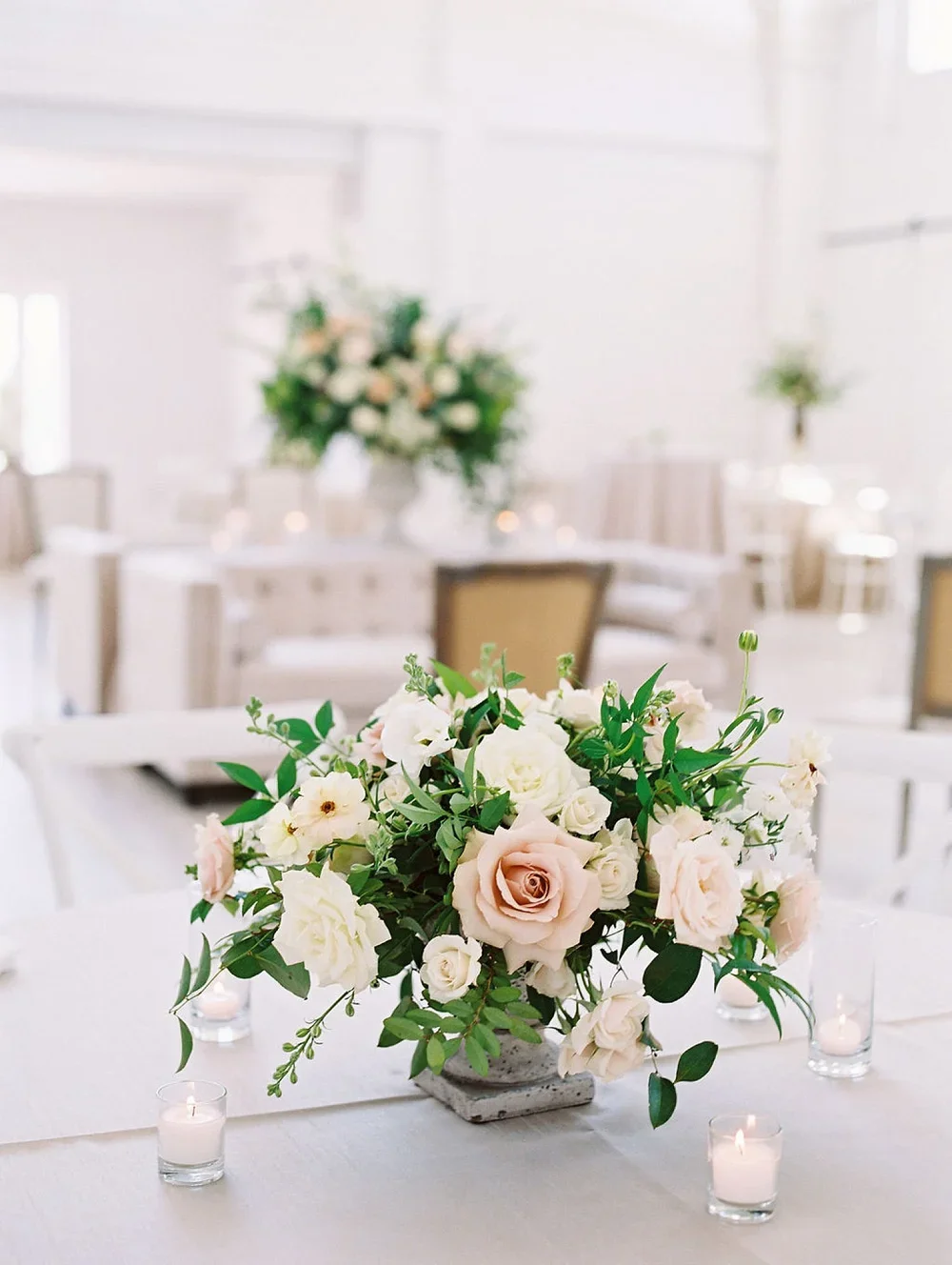 Green and blush flower centerpieces