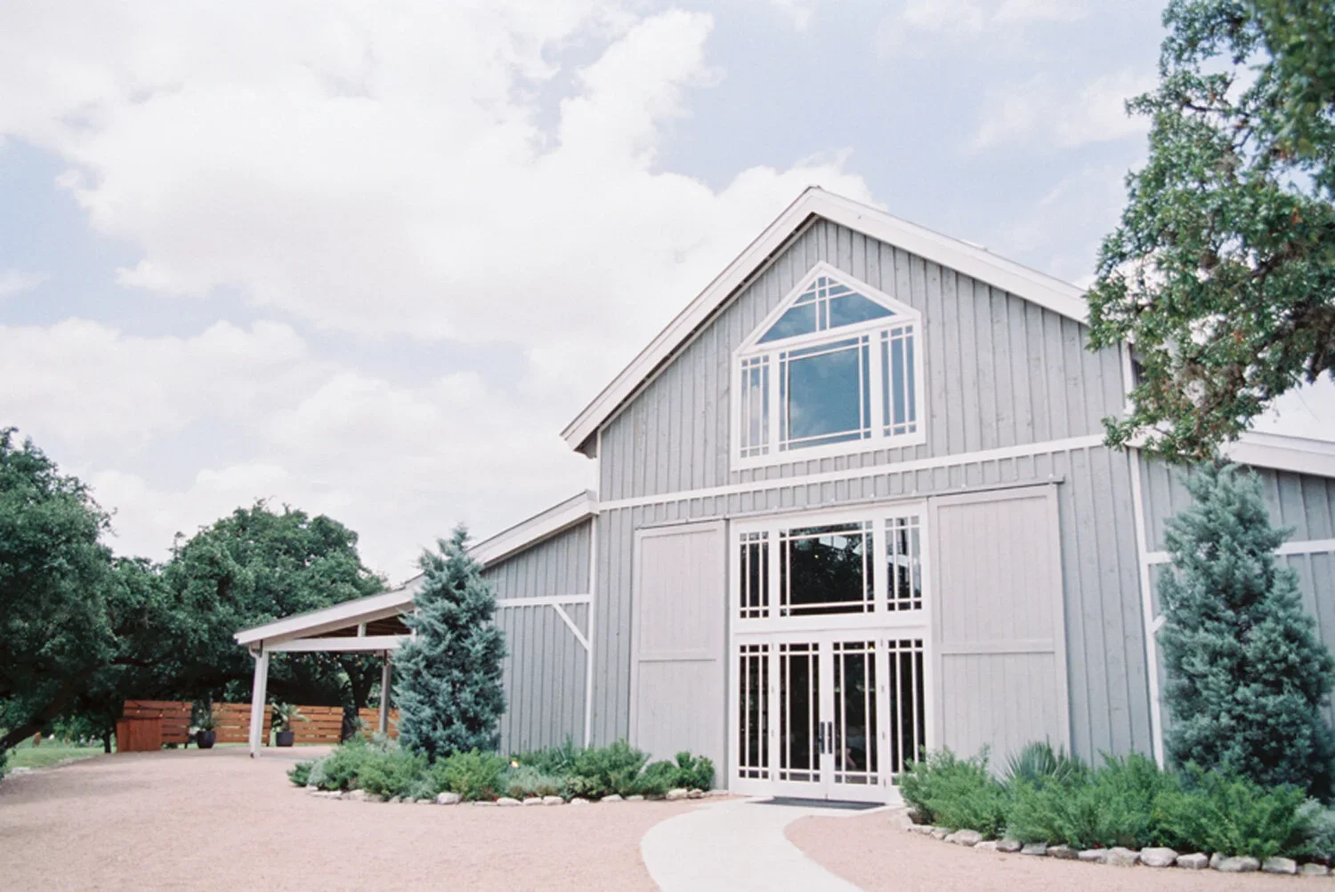 Exterior view of Addison Grove Barn wedding venue in Austin TX
