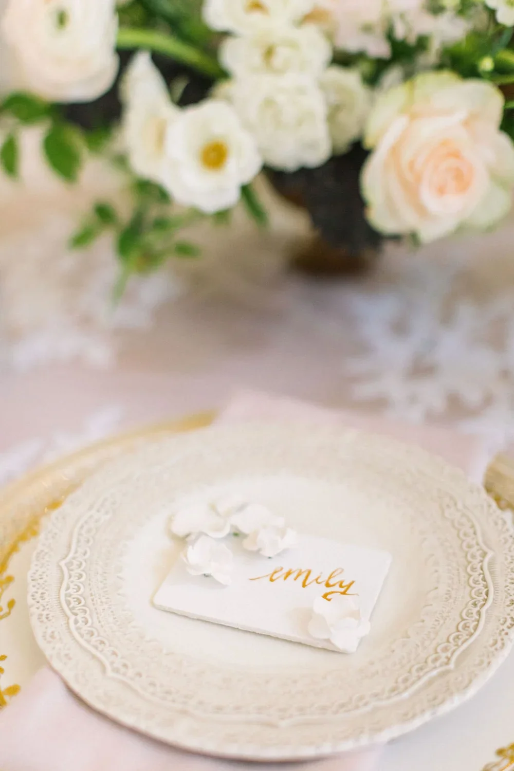Plaster flower escort card &amp; gold calligraphy on plate