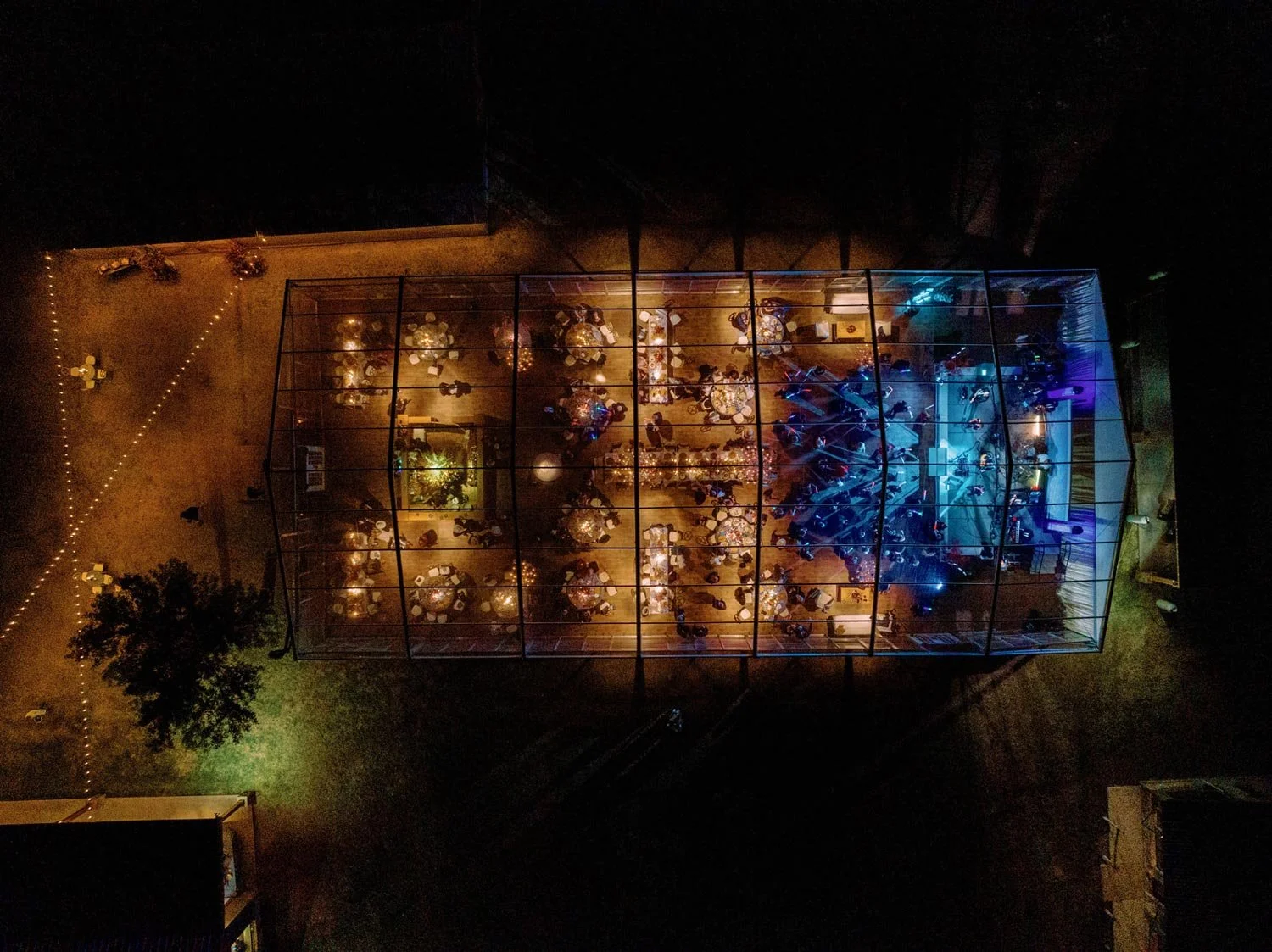 Night view of clear top tented wedding