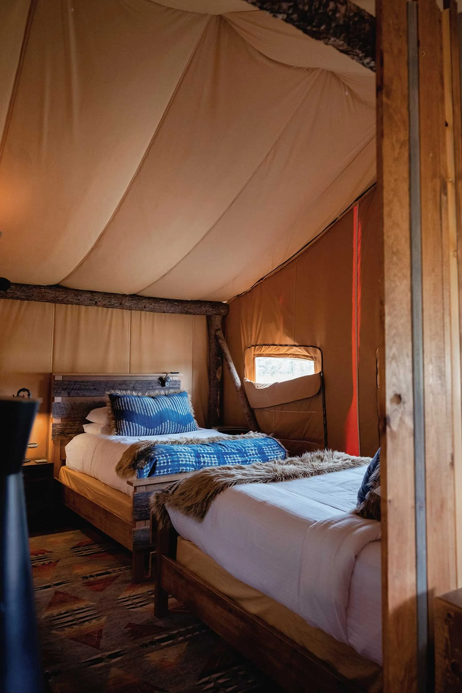 Glamping twin beds at Paws Up Camp