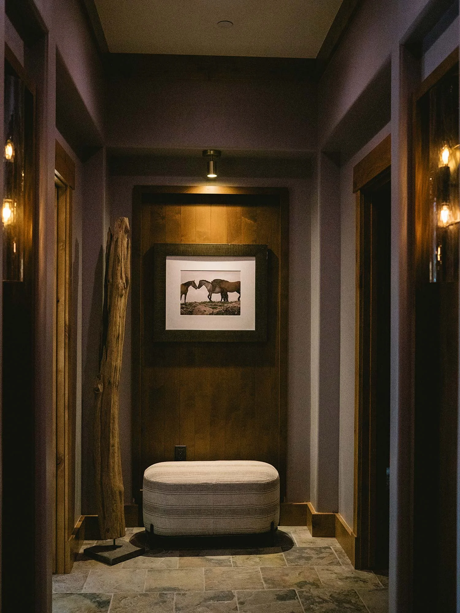 Modern rustic hallway featuring a horse photo