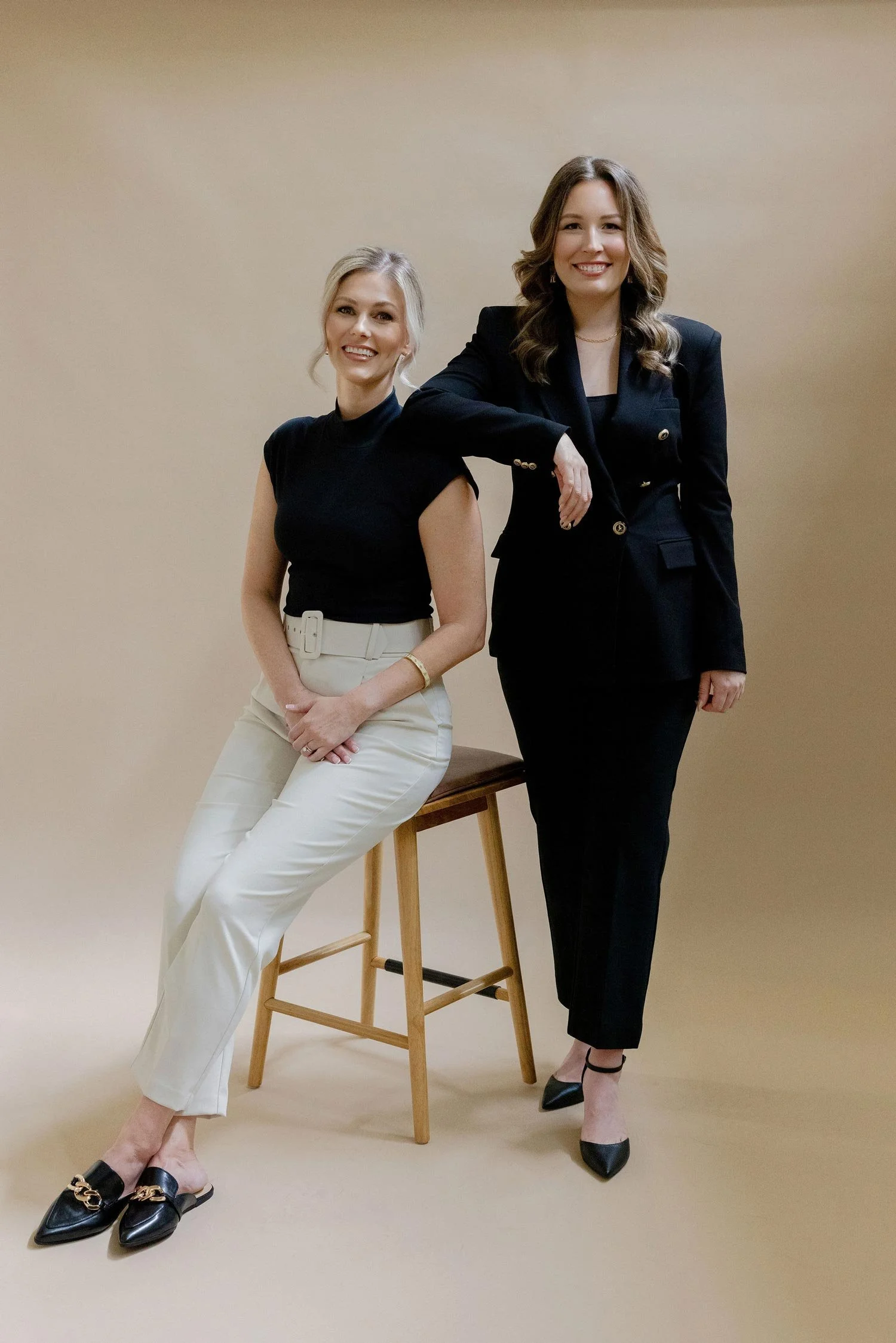 Texas wedding planners Shannon Rose Events team members including Shannon Ducker in a black suite