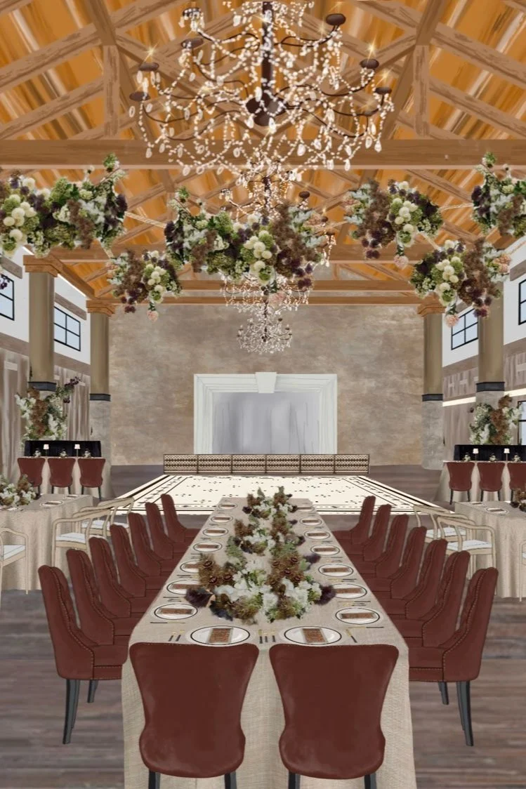 Elegant banquet hall decorated for a wedding or formal event, featuring a long dinner table with brown chairs, floral centerpieces, large floral arrangements, a chandelier, and a wood ceiling with exposed beams.