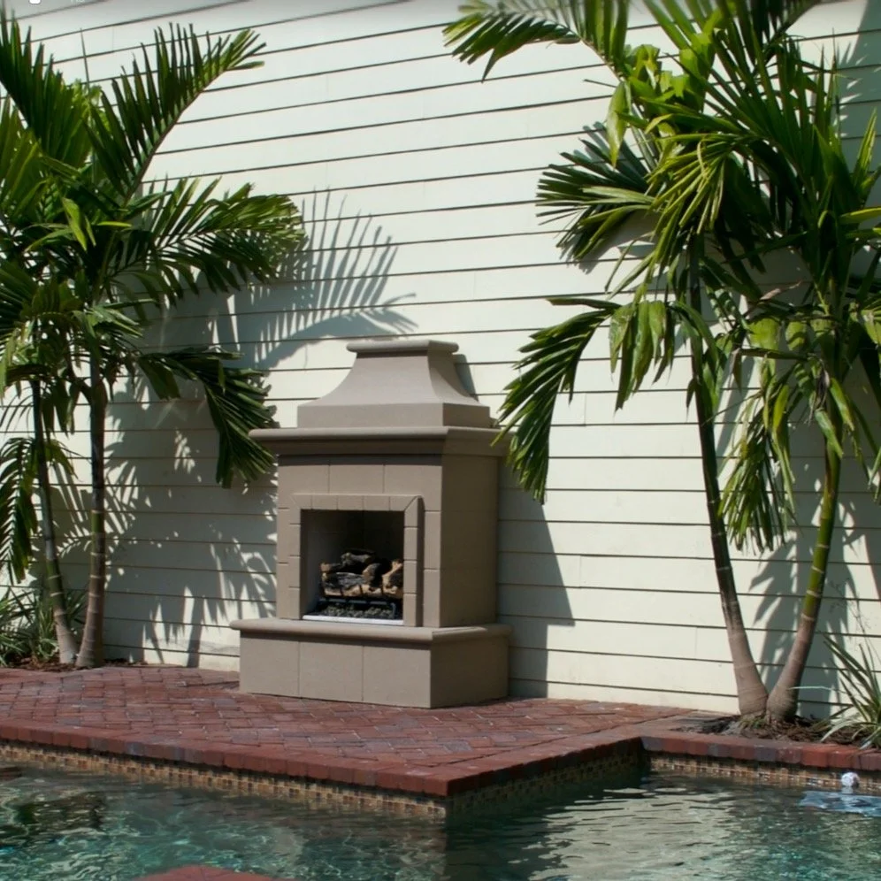 Custom pool, spa, pergola, fireplace, and garden retreat designed as a complete outdoor living experience.

Warm brick, bronze mosaic tile, tropical planting, and timeless architectural detailing helped make this award-winning project truly unique. ?