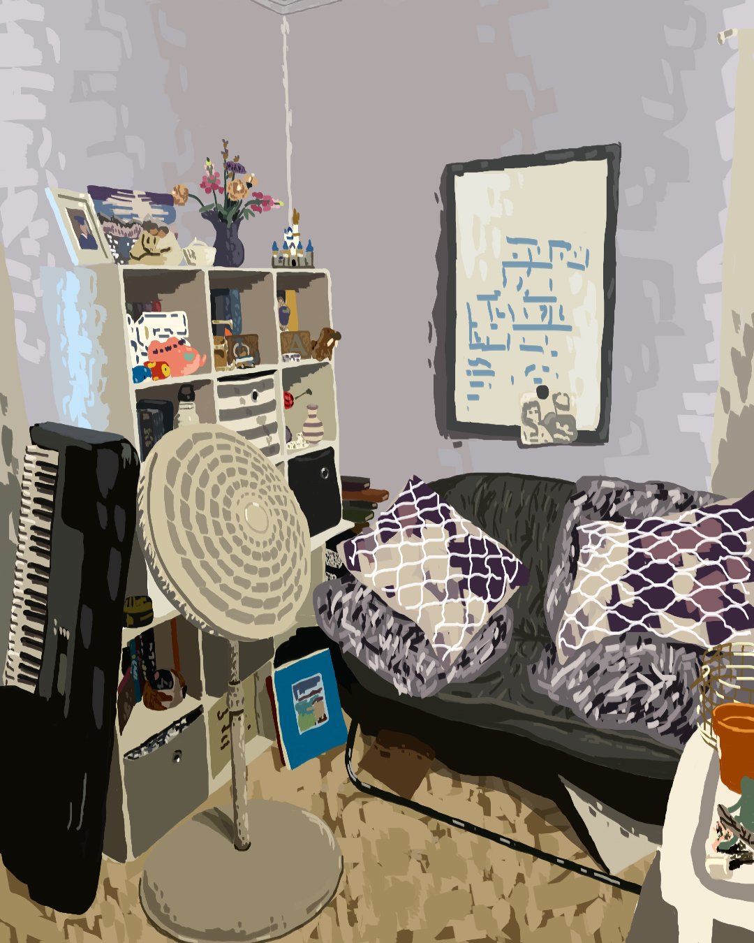 A living room with a black couch, purple and white patterned pillows, a white bookshelf with various items, a standing fan, and a framed artwork on the wall.