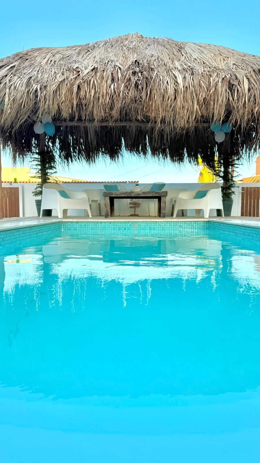 Outdoor private pool surrounded by tropical greenery at Kas Pitava Boutique Stay in Bonaire