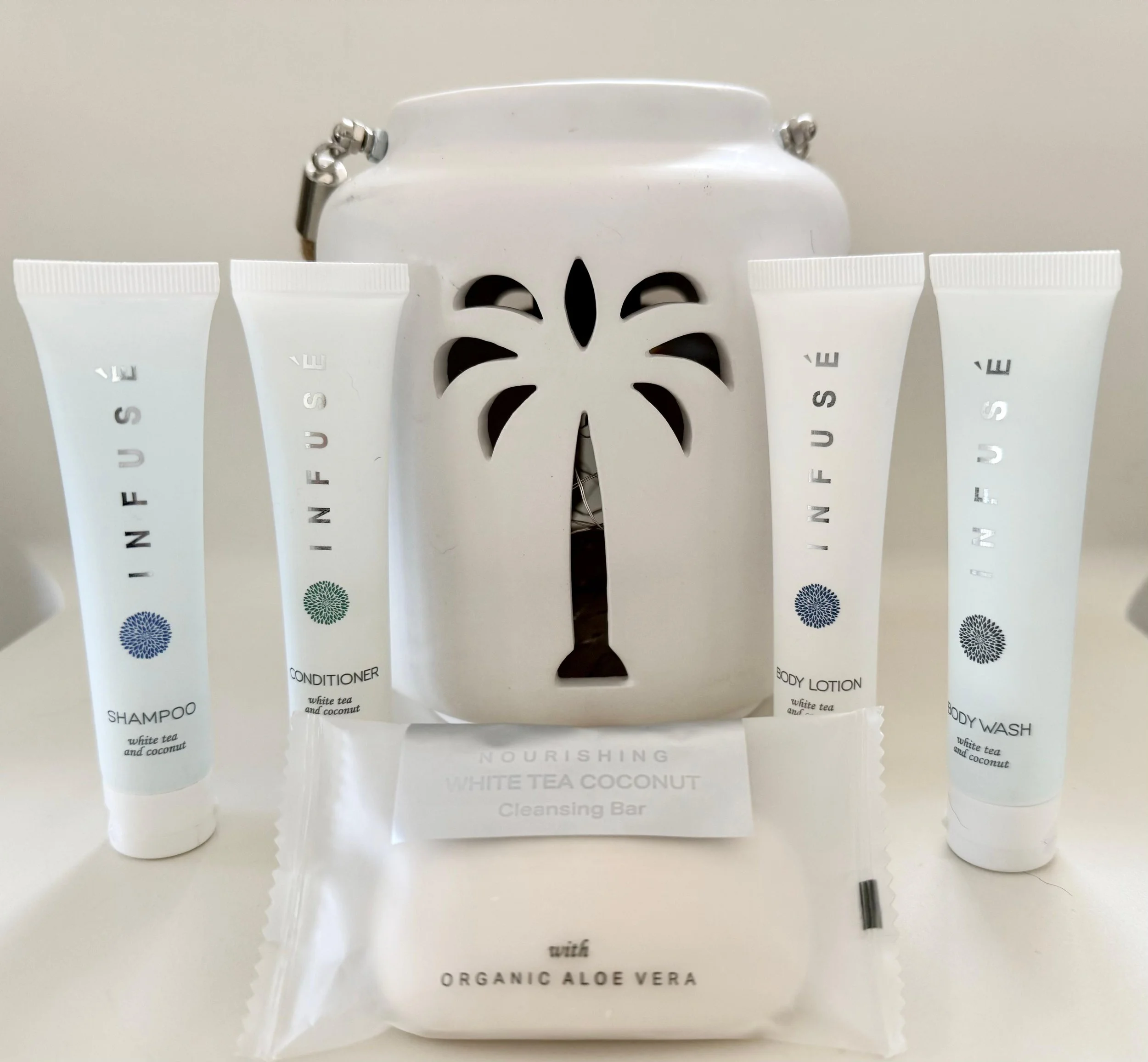 Infuse amenities and plush towels prepared for guests at Kas Pitava.
