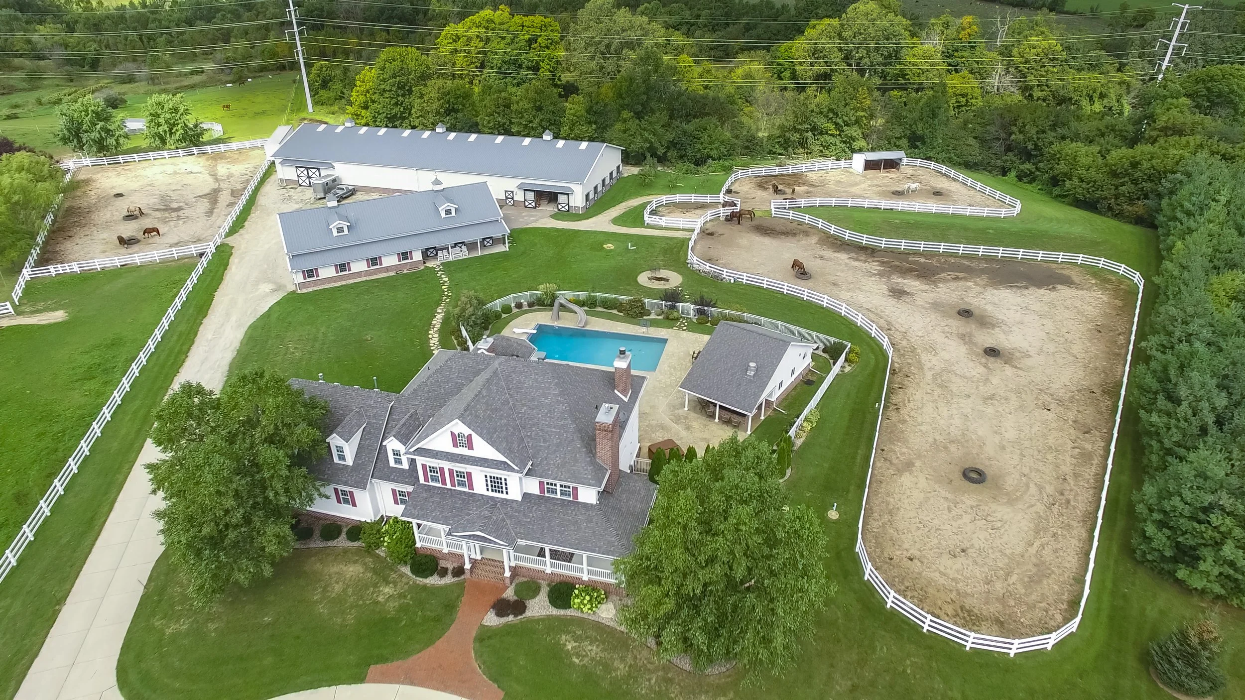 Milton home with horse barn and pool