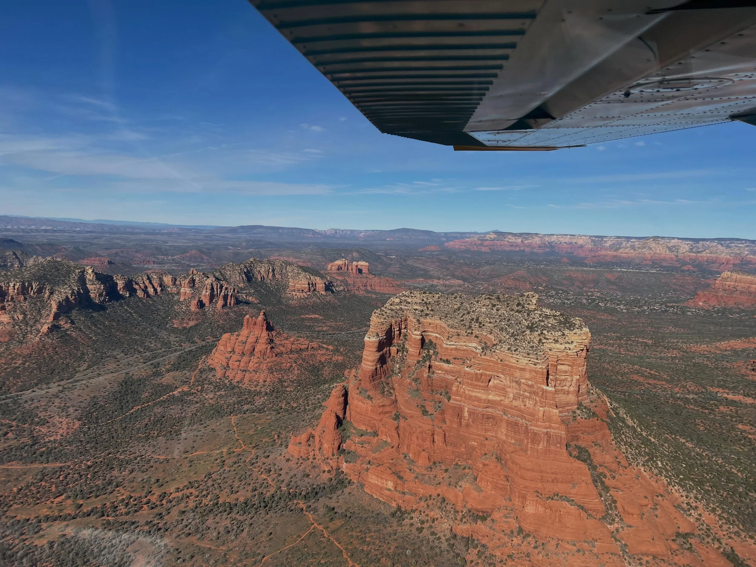 The side of Sedona most people never see 👀

Courthouse Butte &amp; Bell Rock&mdash;from the back, from the air&hellip; a whole different perspective.

#Sedona #BellRock #CourthouseButte #AerialViews #arizona