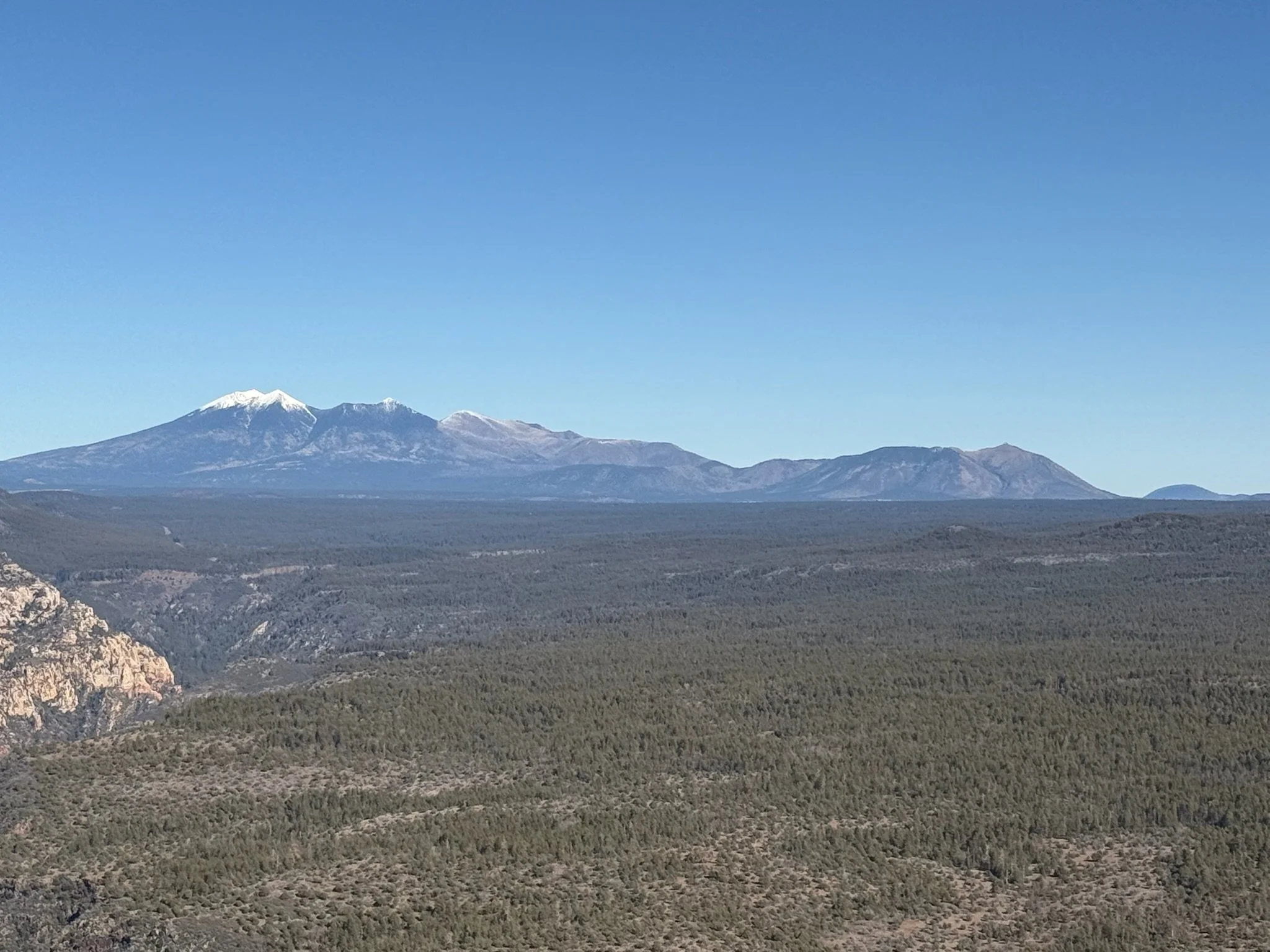 San Francisco Peaks from a distance during Sedona air tour