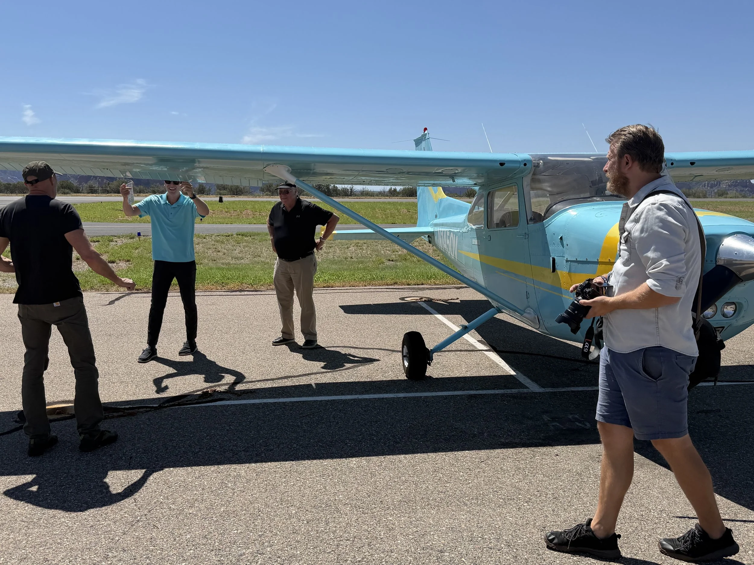 Walking around the plane at Sedona airport | Bluebird Air Tours