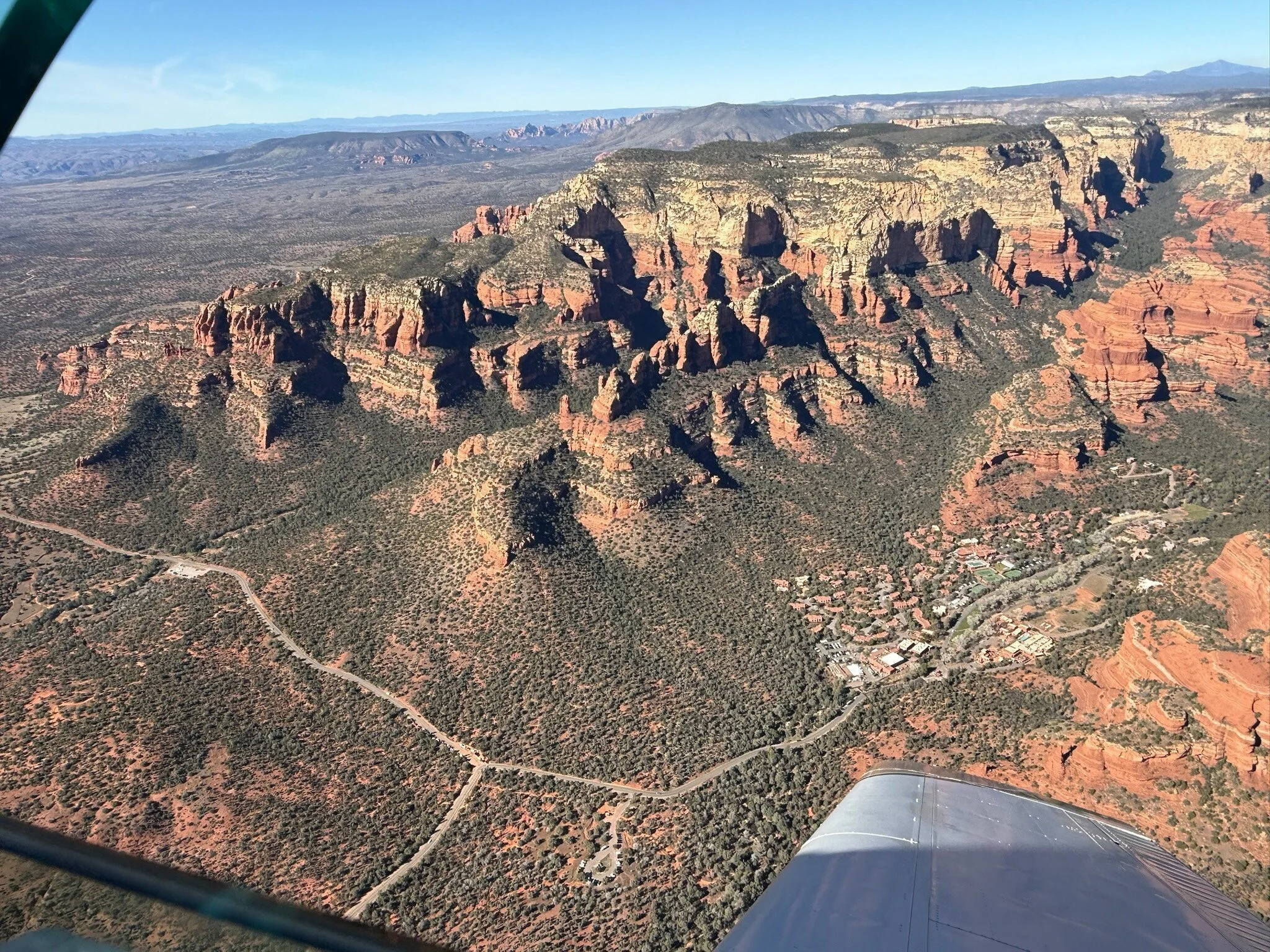 High altitude view of Sedona red rocks and surrounding valleys