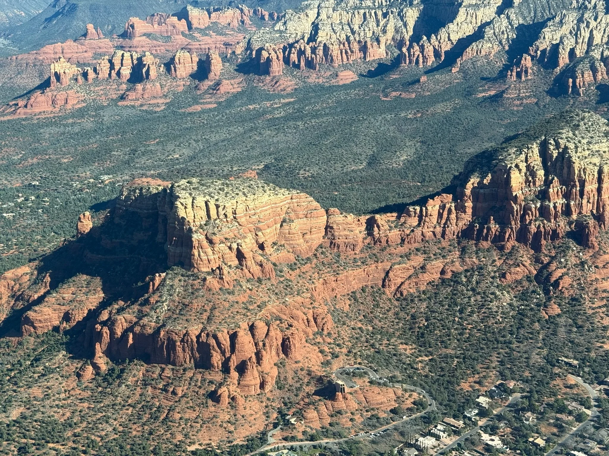 Aerial view of Sedona red rocks during a scenic airplane tour