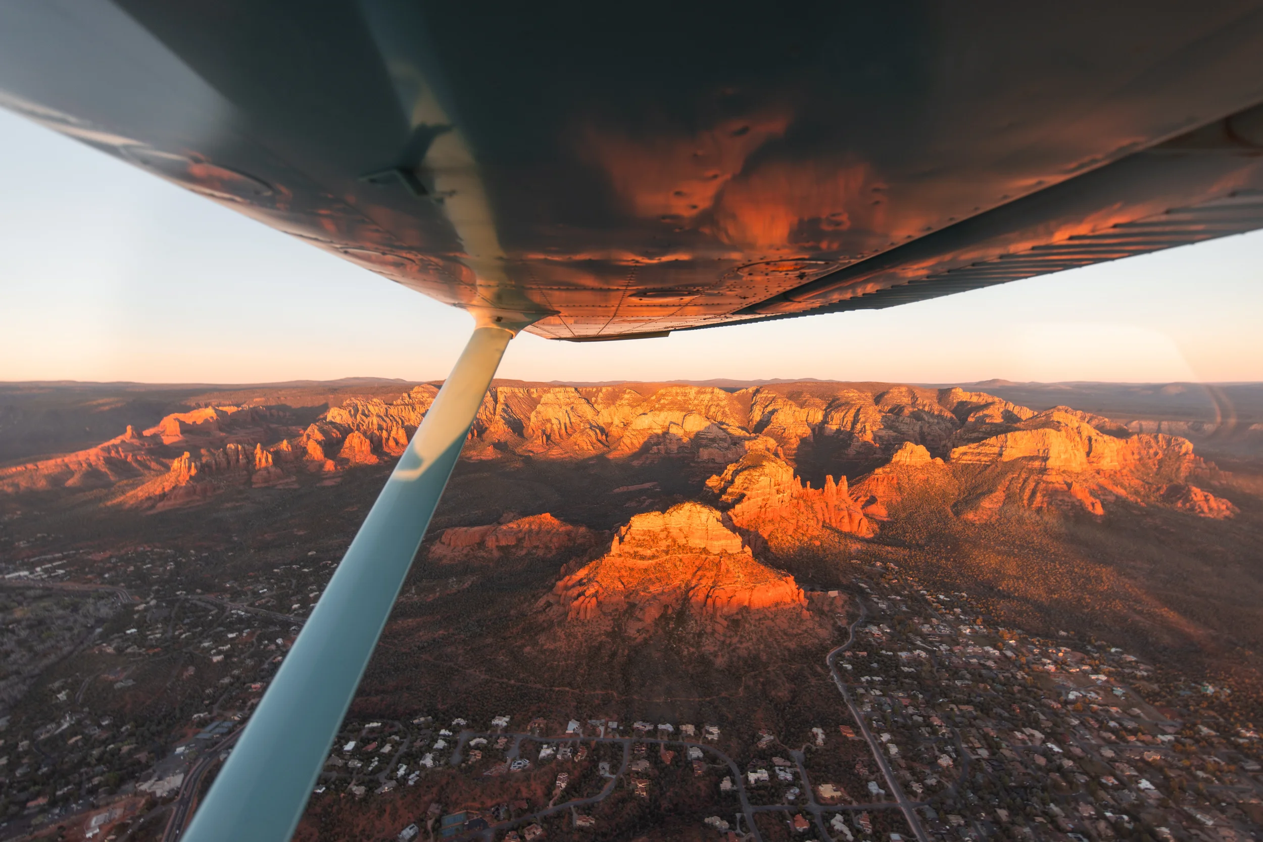 Warm sunset light over Sedona viewed from airplane