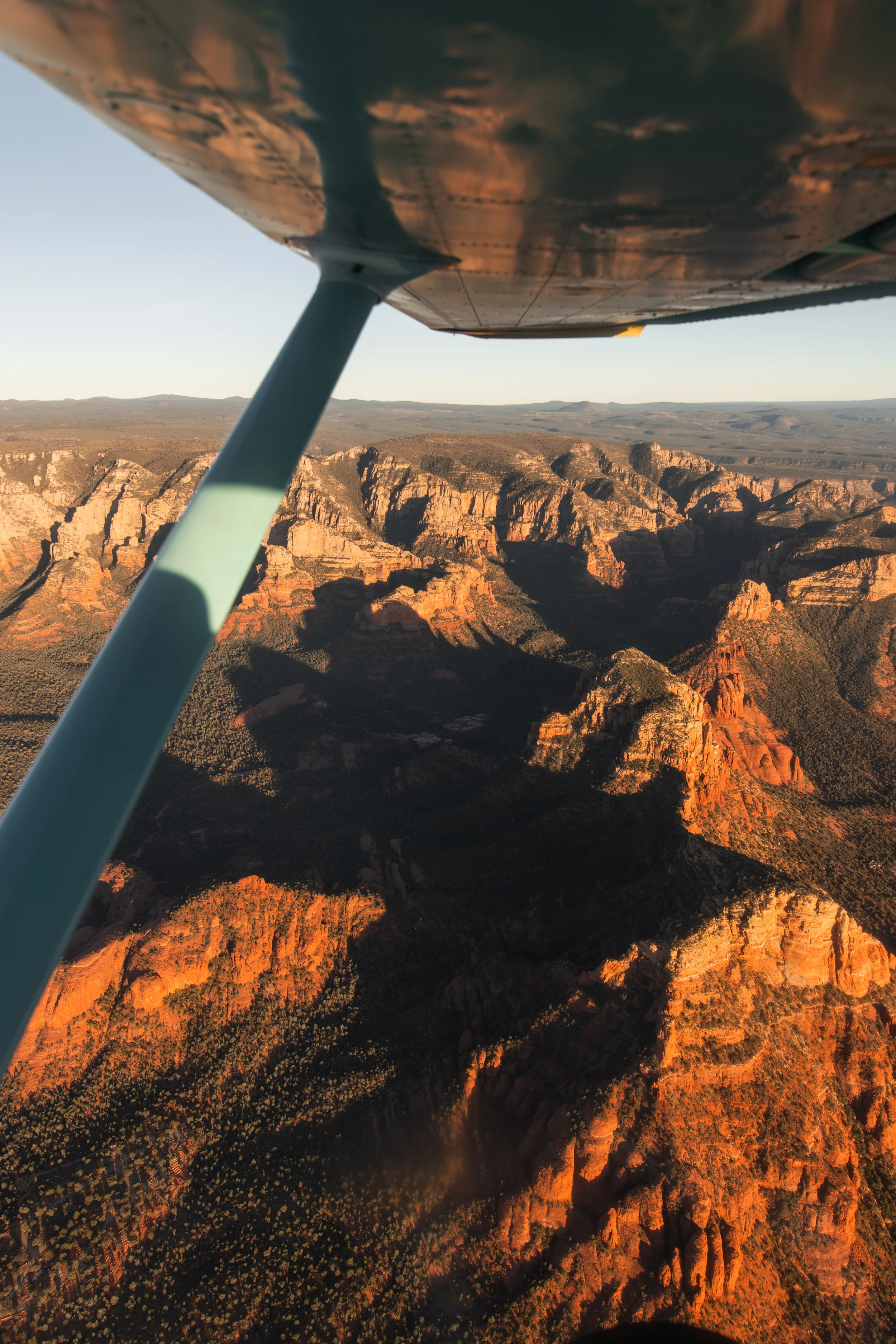 Dramatic sunset aerial view of Sedona canyon landscape