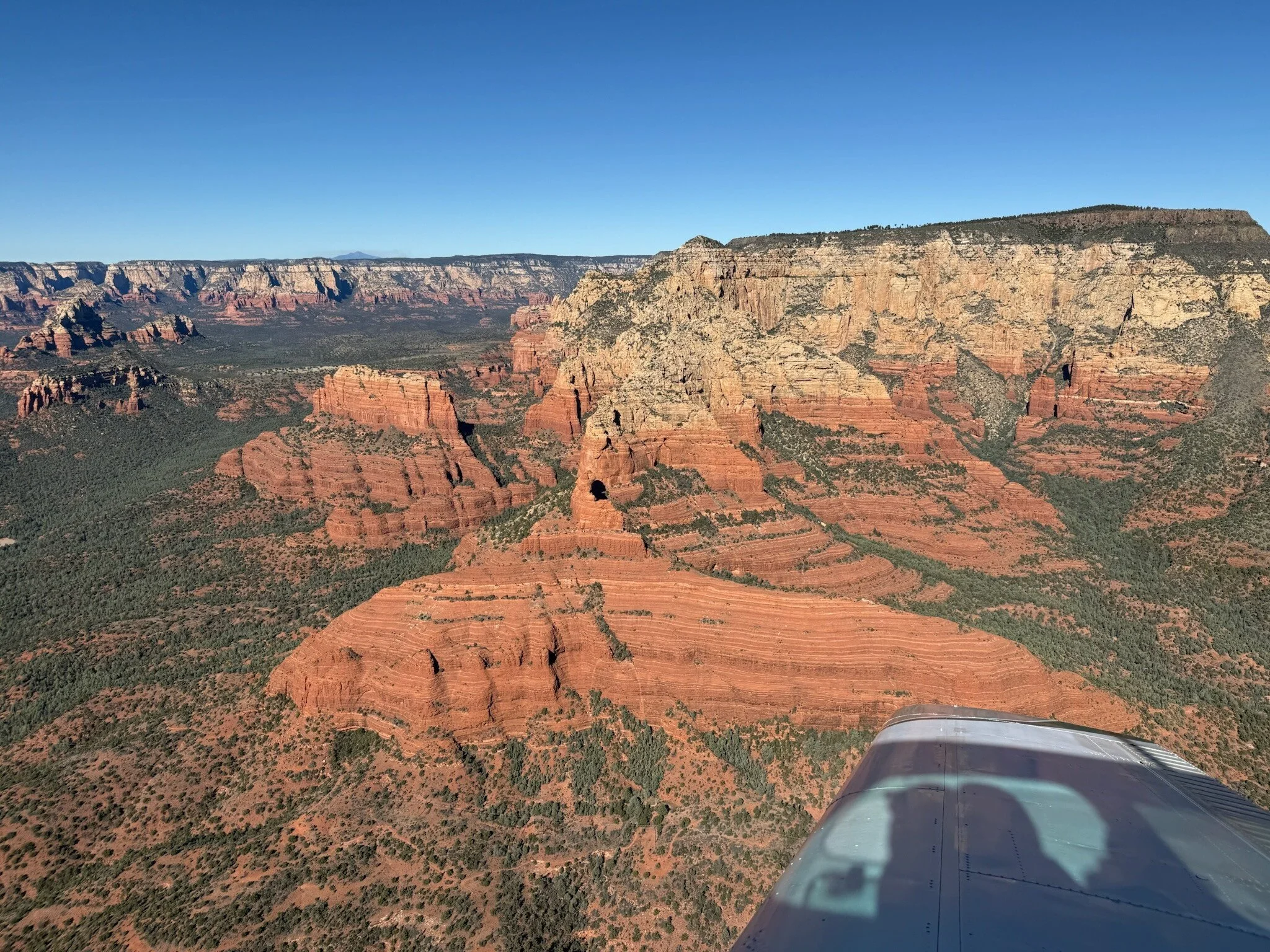 Bluebird Air Tours flight over iconic Sedona landmarks