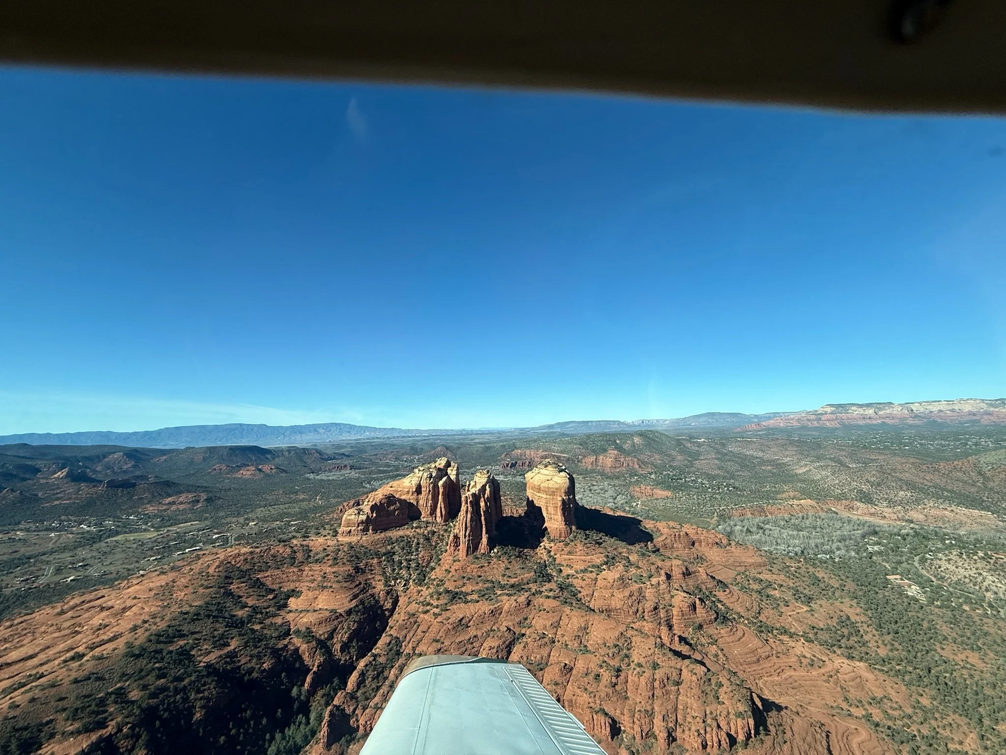Expansive aerial shot of Sedona Arizona desert terrain
