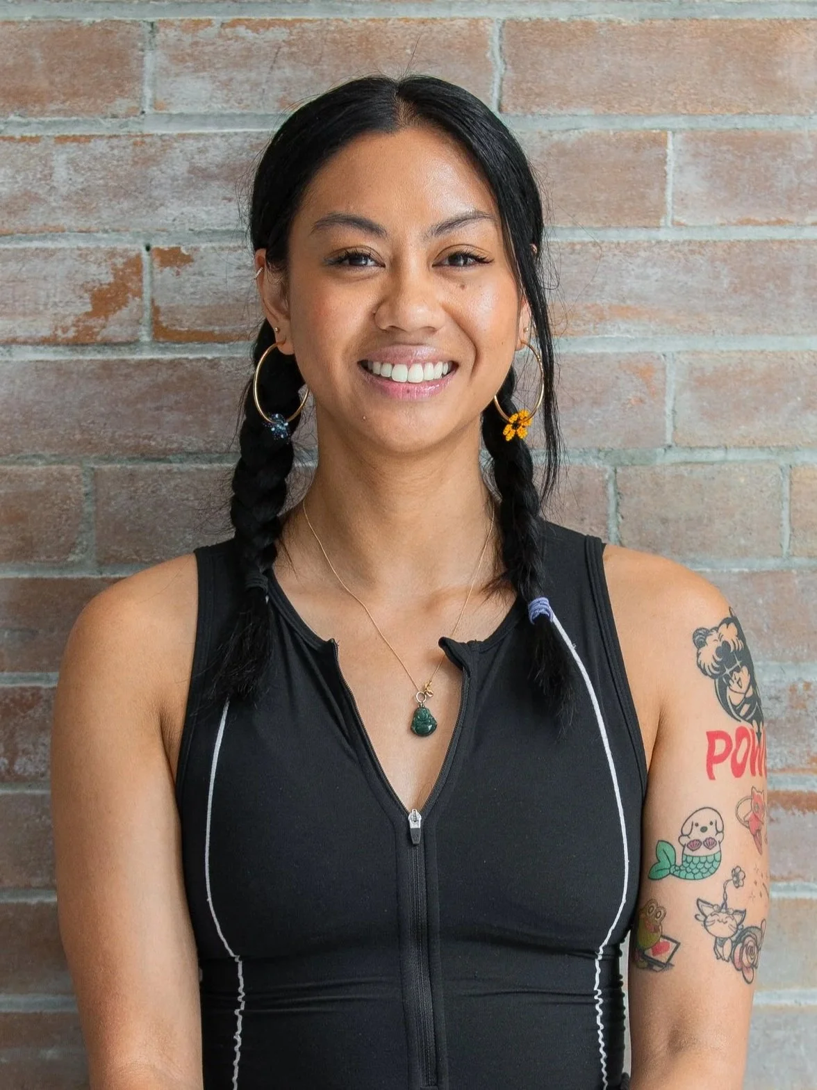 Therese seated and smiling