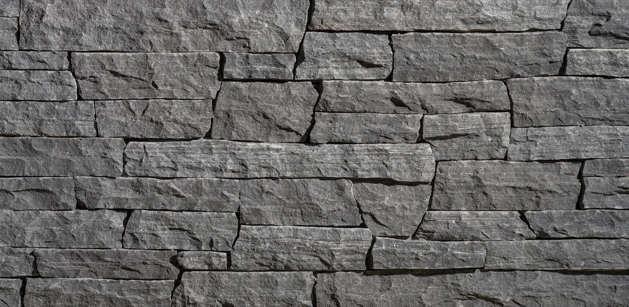 Dark gray ledgestone from the Old World Stone line, a comprehensive selection of natural stone veneer products with a wide variety of cuts and colors.