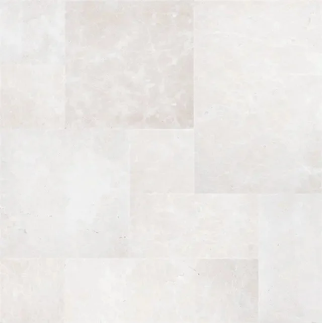 Pera Cream is an off-white marble with subtle swirling. Shown in a French Pattern with a sandblasted texture for slip resistance.