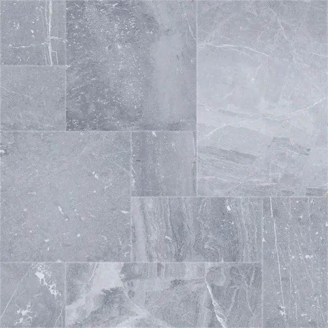 Mid gray marble with dark swirls and white veining and swirls.  Shown in a French Pattern with a sandblasted texture for slip resistance.