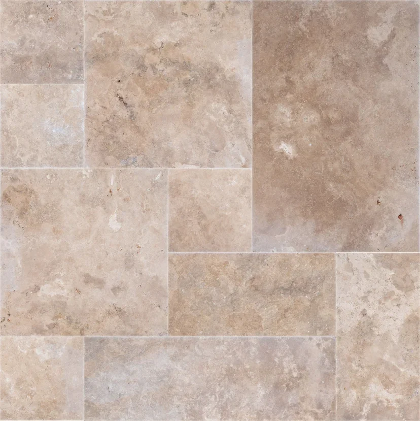 Close-up of beige and tan travertine arranged in a pattern.