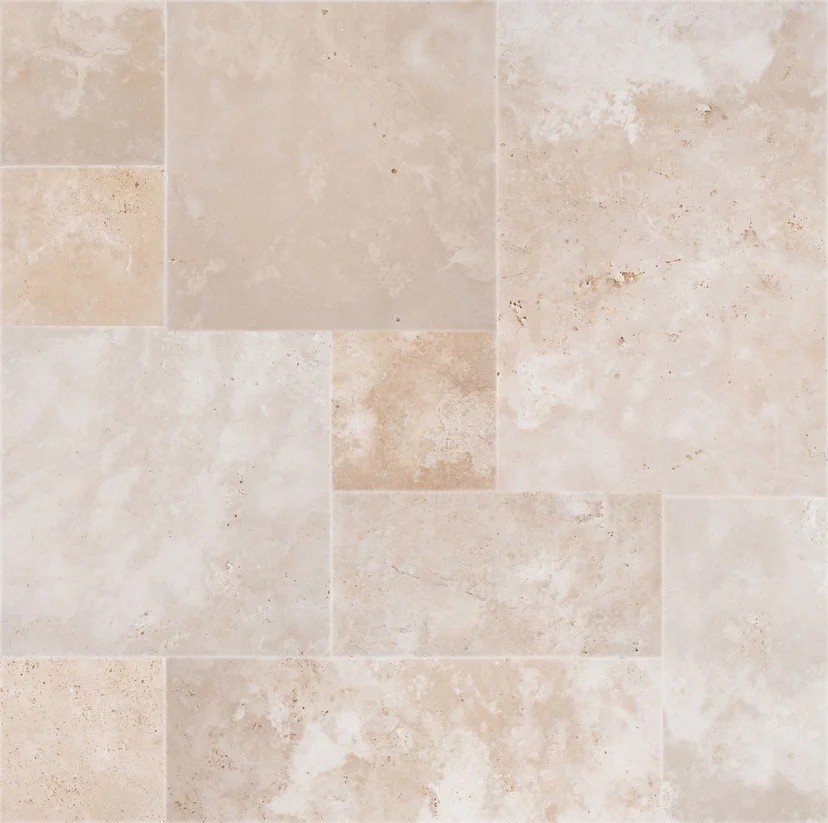 Cream colored travertine with buff swirling where the signature travertine pitting is exceptionally small, making it both aesthetically pleasing, safer and more durable in a freeze susceptible climate.   Shown in French Pattern.