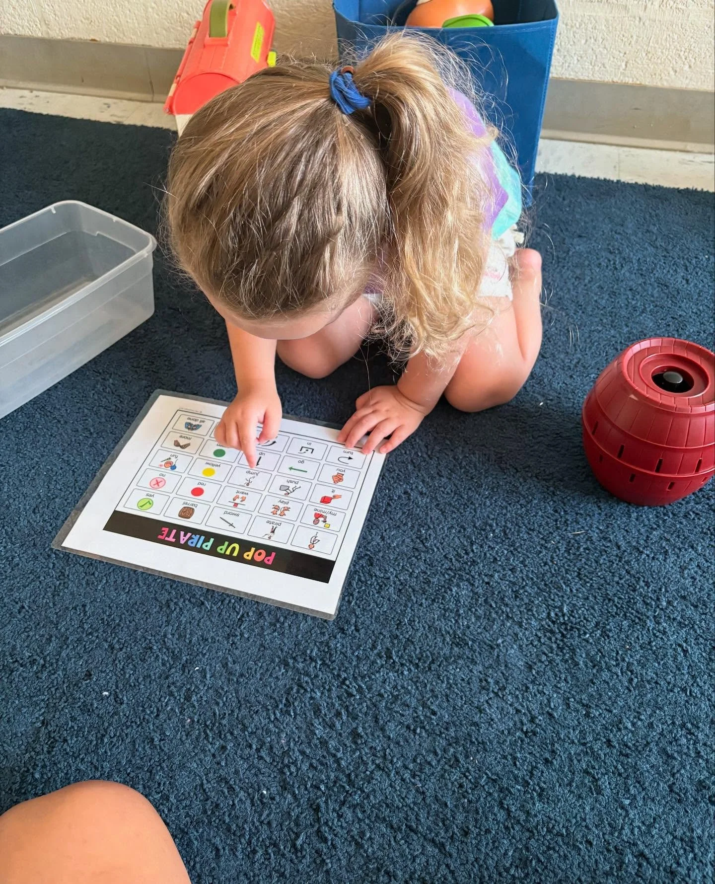 This is what low-tech AAC can look like in a session. Having a communication board out during game play is a fun way to promote language, encourage making choices, and initiating communication. 

I&rsquo;ve also noticed communication boards being ins