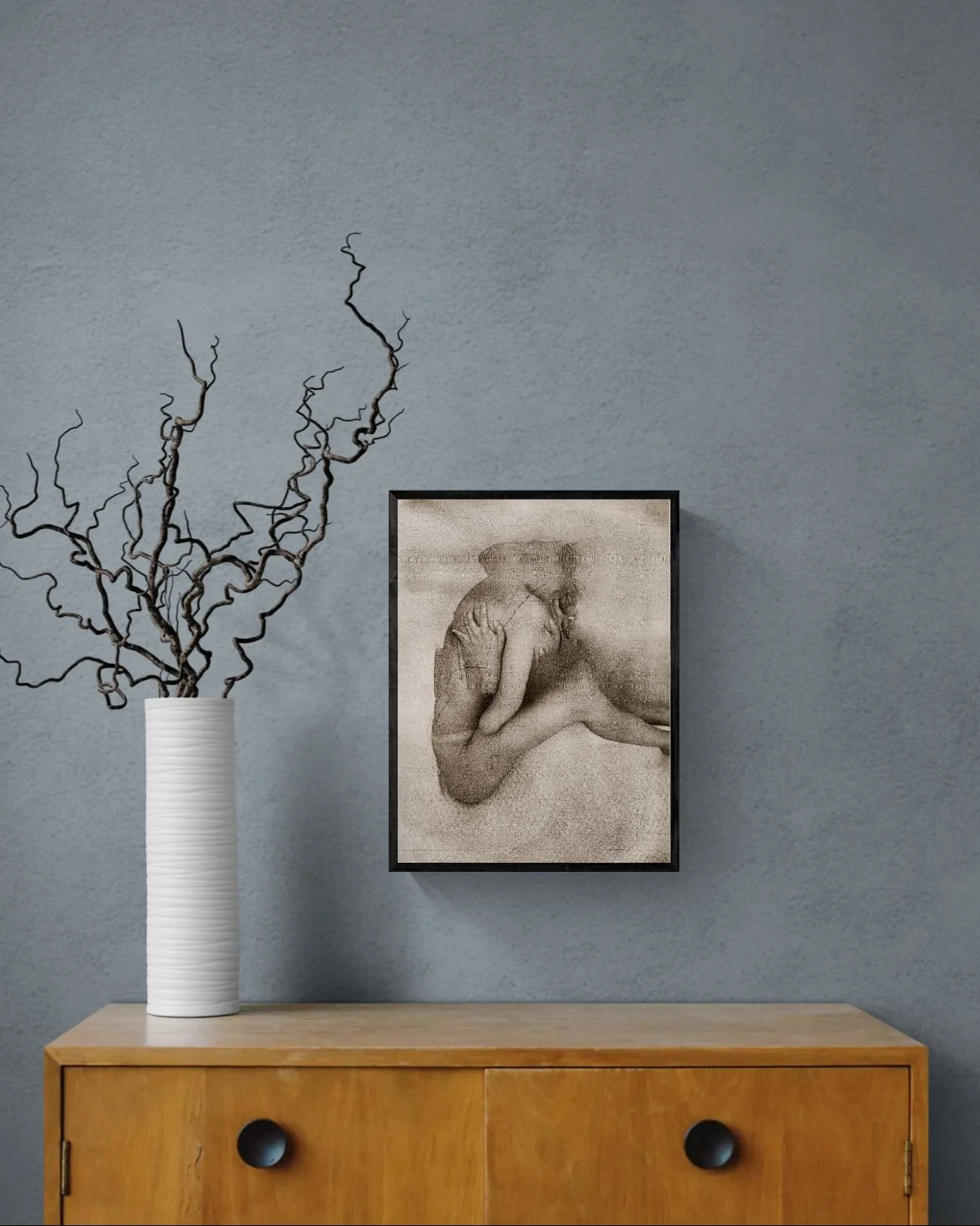 Curly twigs in vase sitting on cabinet (1).jpeg