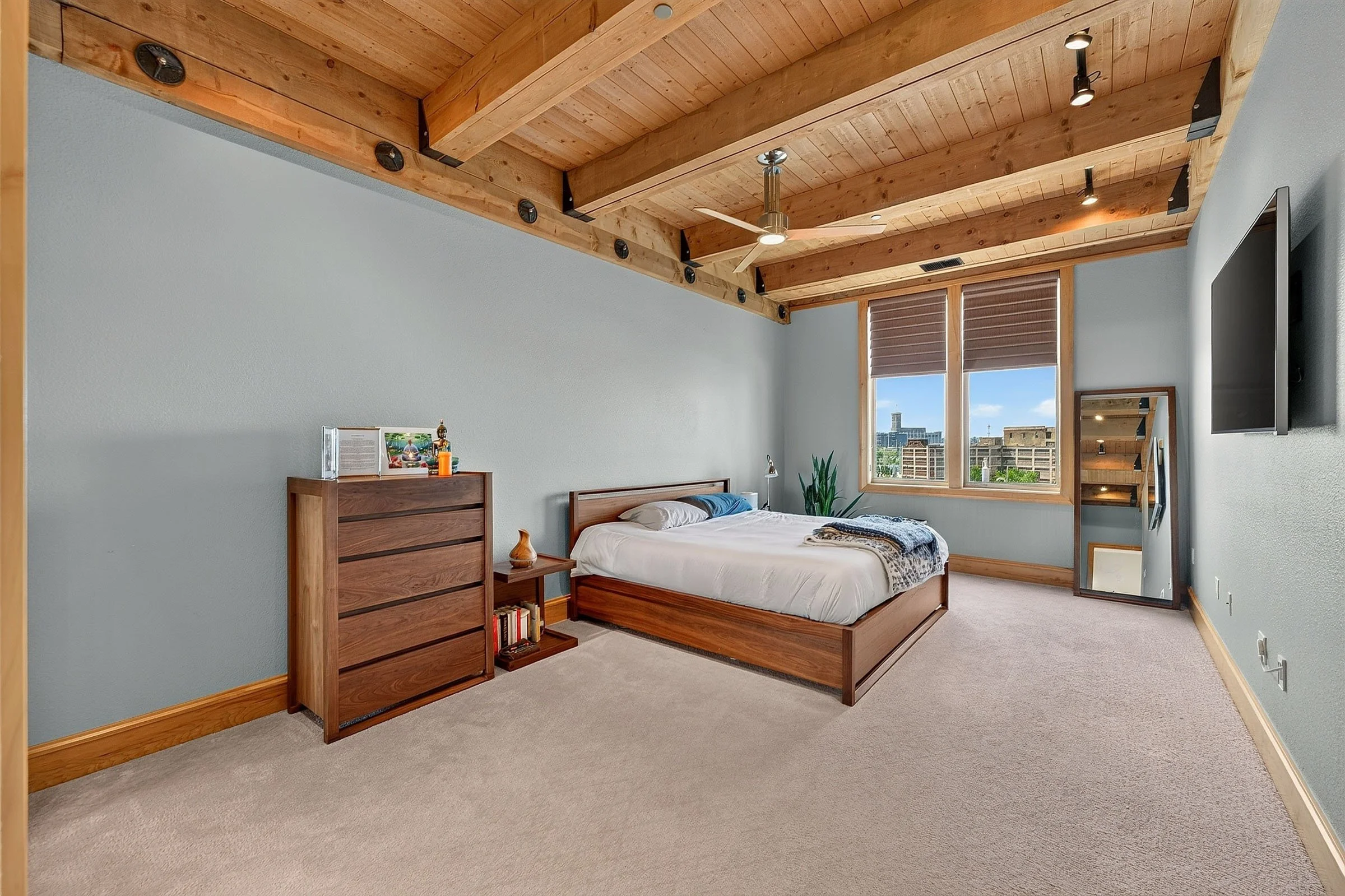modern contemporary bedroom in upscale milwaukee apartment - real estate photography