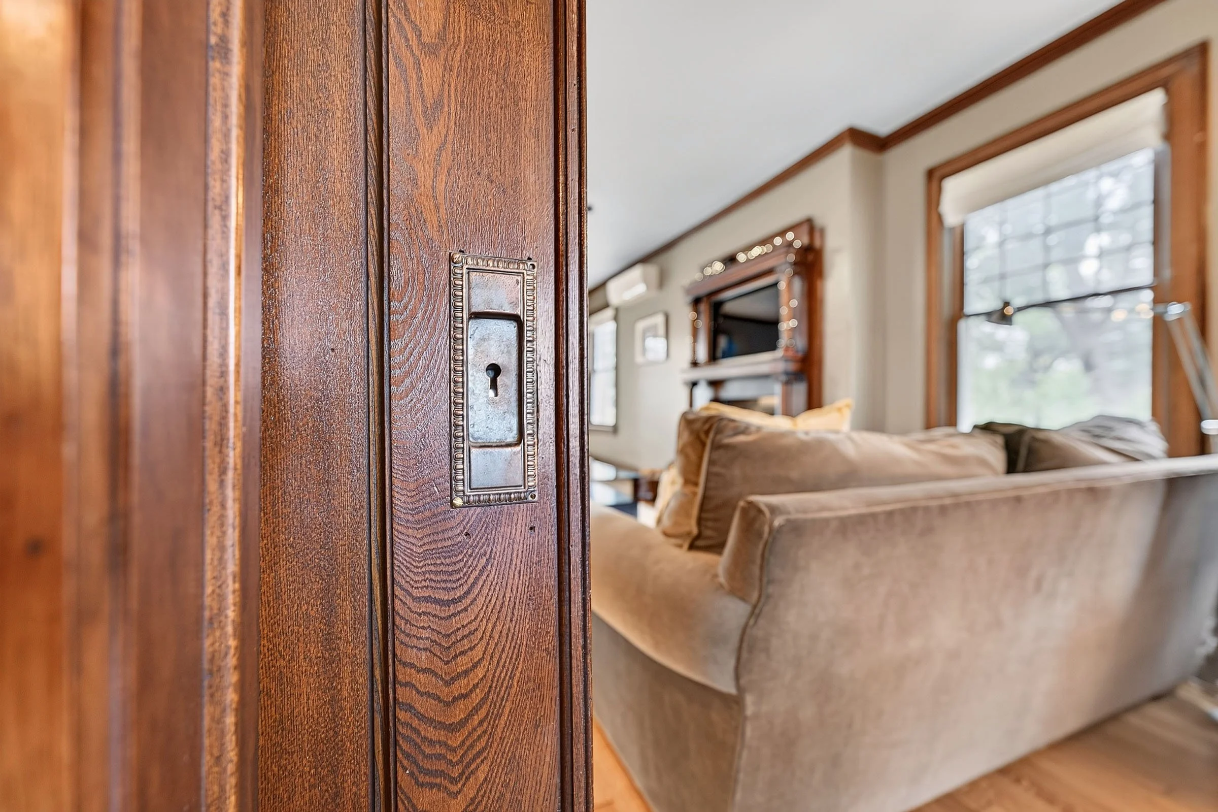 Luxury antique home detail photography of a keyhole for a dining room door - real estate listing photography ©Dream Home Real Estate Media