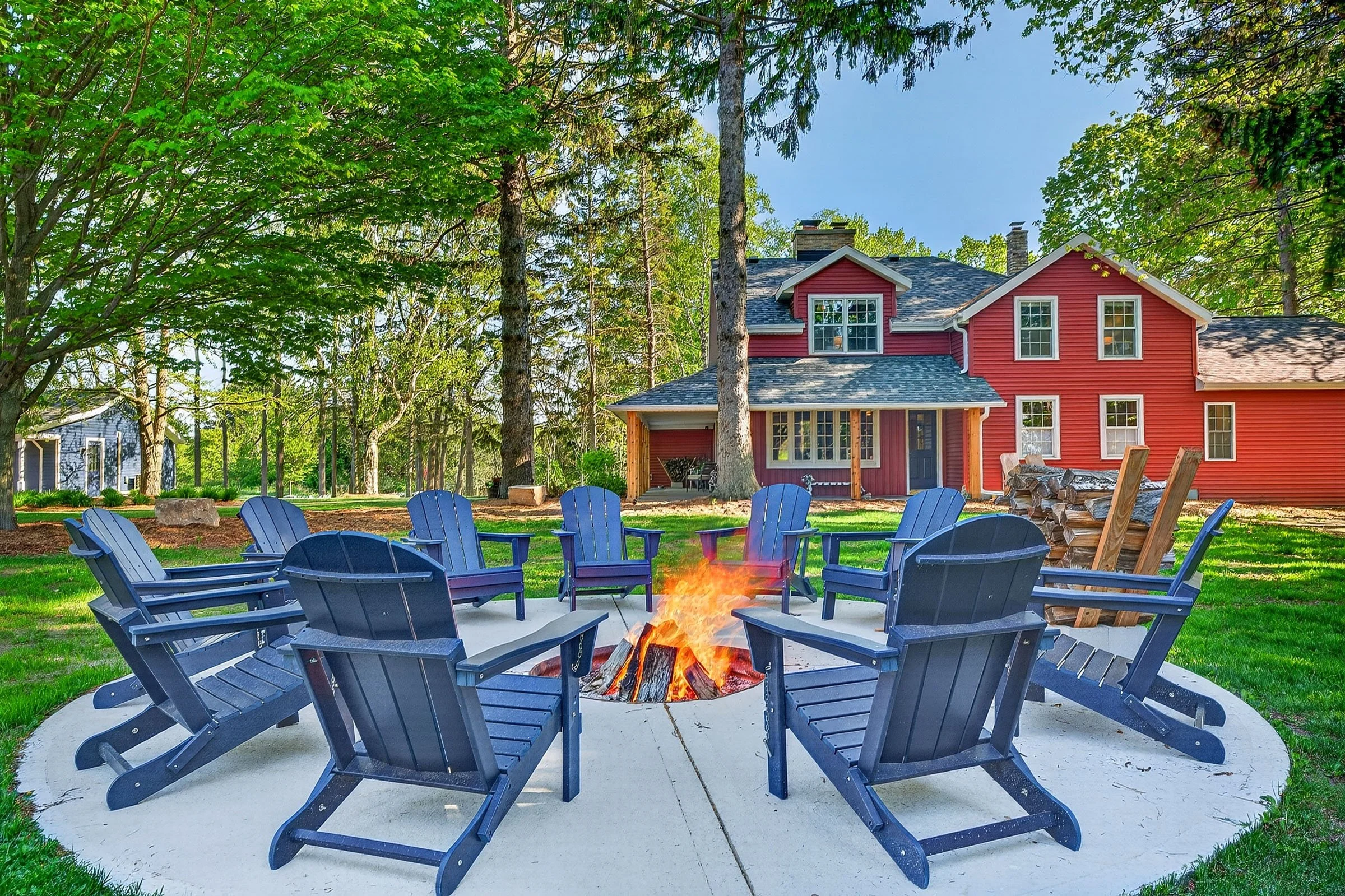 airbnb / vrbo / vacation rental photography by dream home real estate media showcasing a fire pit for a property in southeastern wisconsin