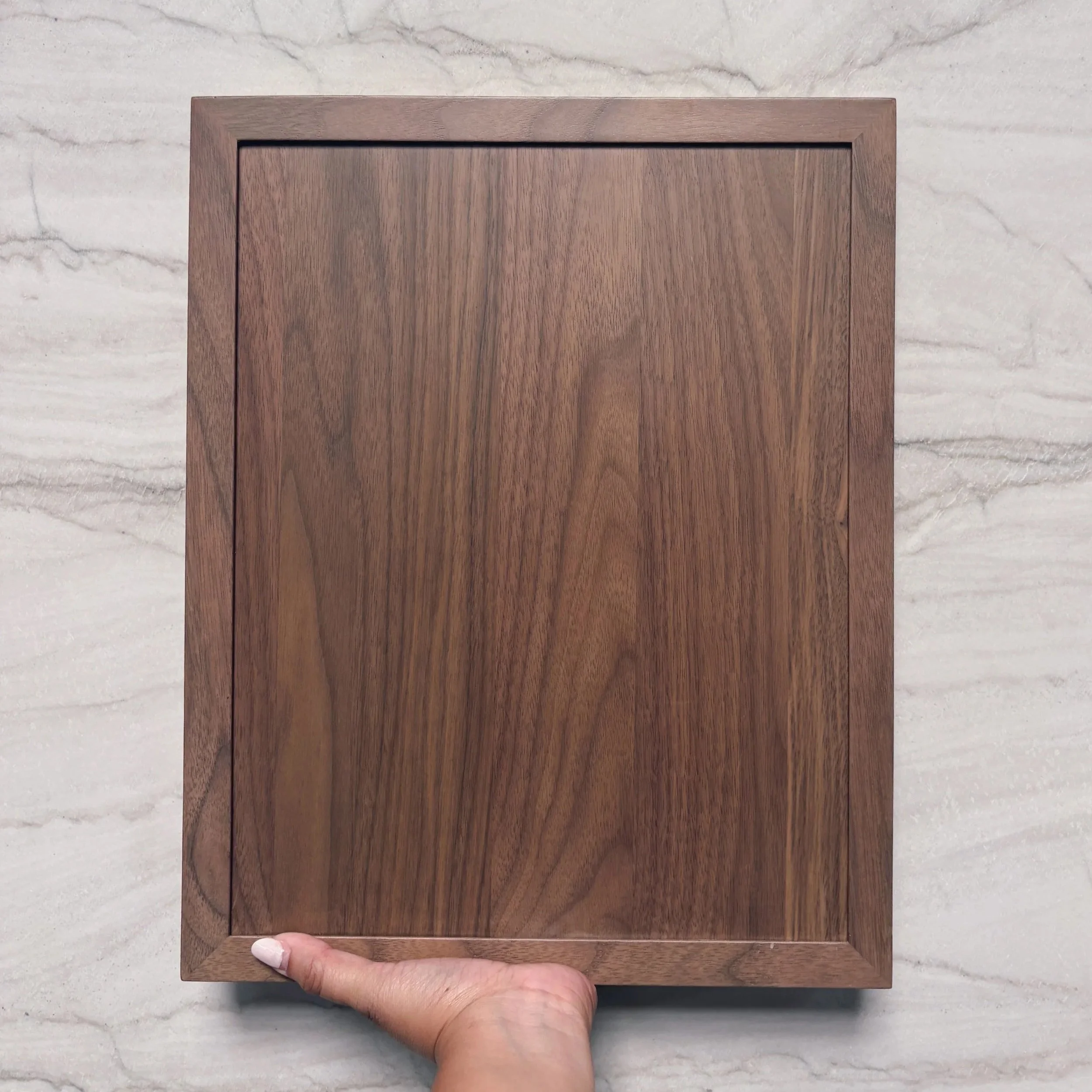 Custom wood cabinetry sample and marble finish for residential interior design in Boston, MA.