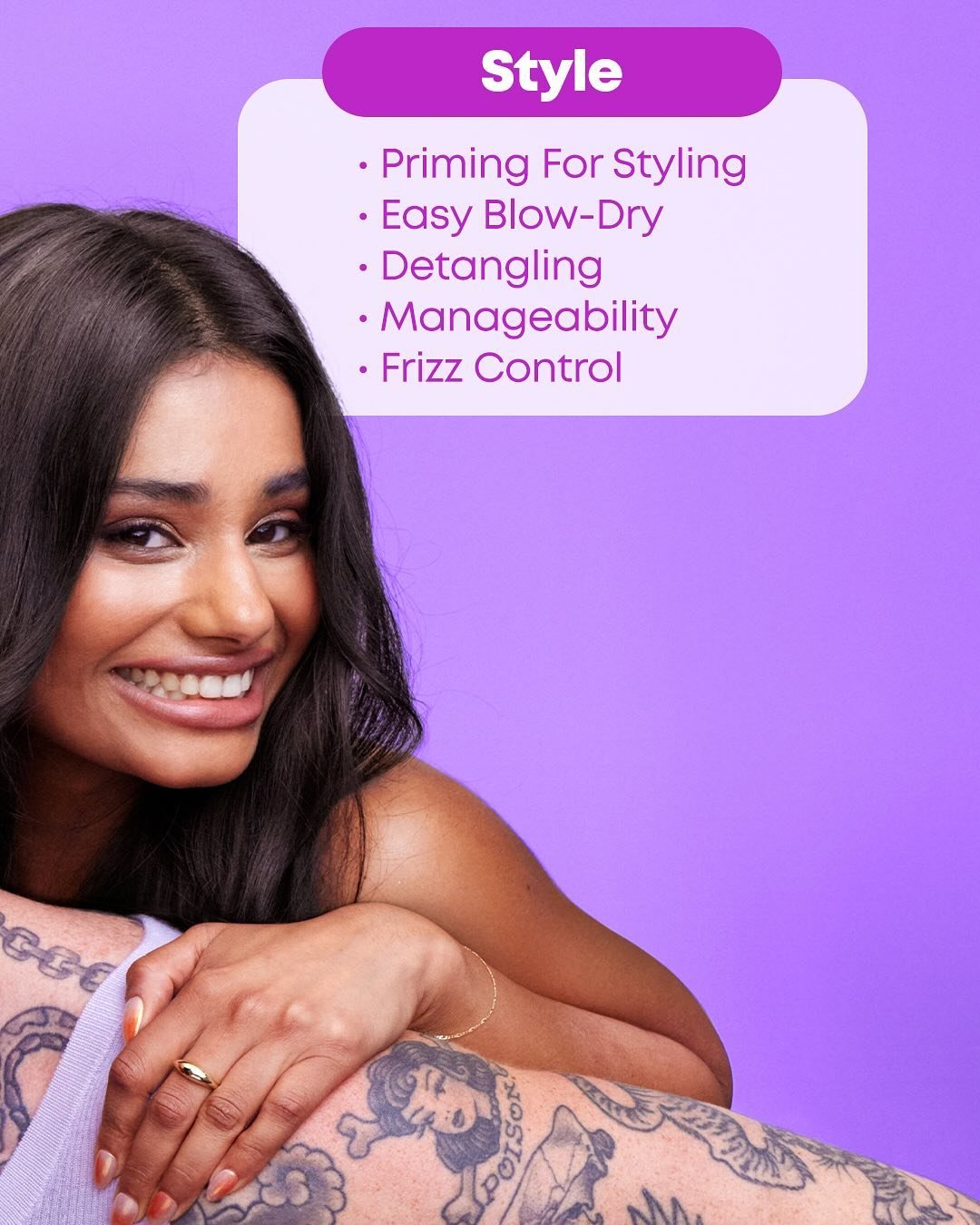 Woman with long dark hair smiling and leaning on a tattooed arm against a purple background. Text on the image reads: 'Style, Priming For Styling, Easy Blow-Dry, Detangling, Manageability, Frizz Control.'
