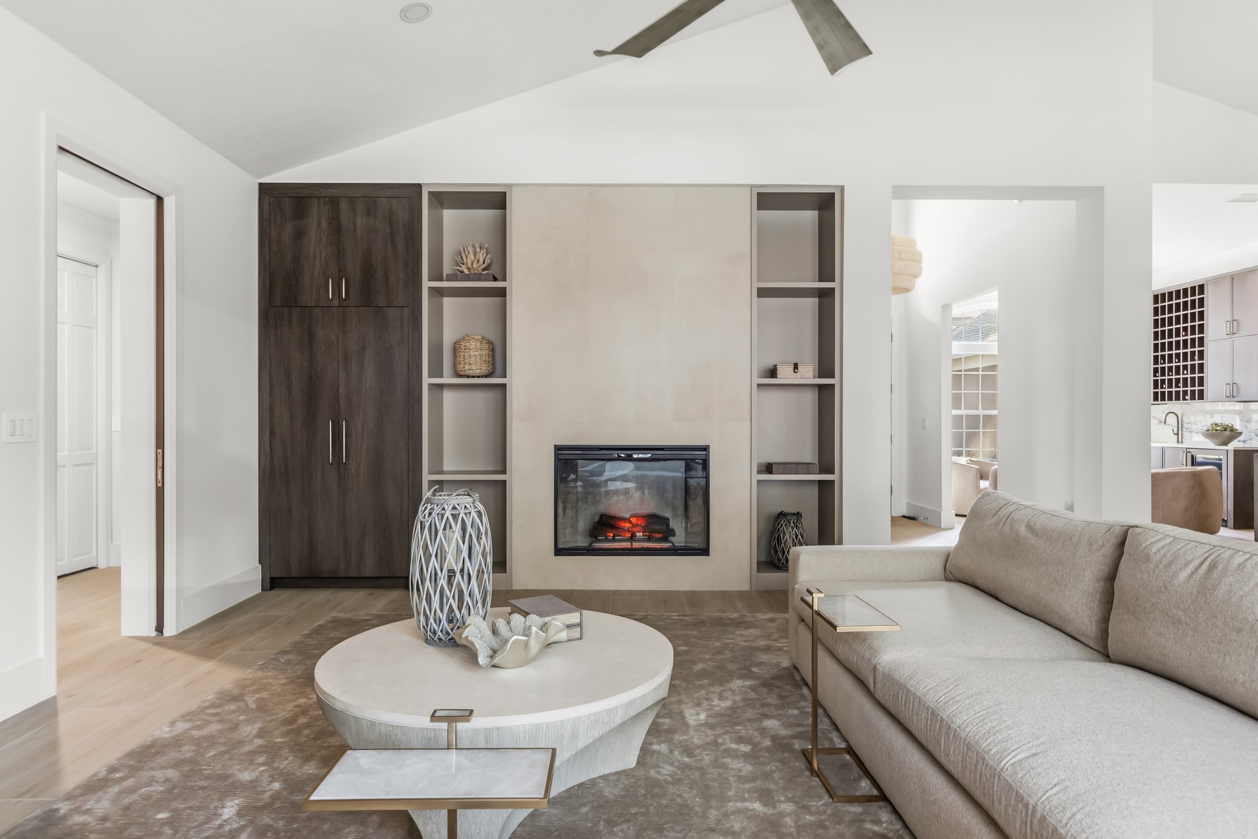 Living room remodel with built in cabinetry and shelves