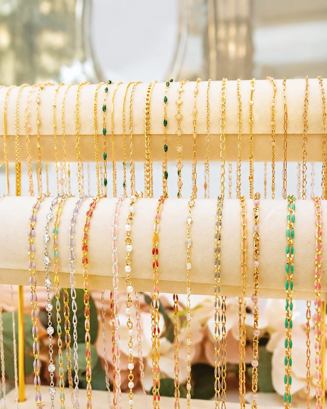Gold and Silver Bracelets on Display Stand.jpg