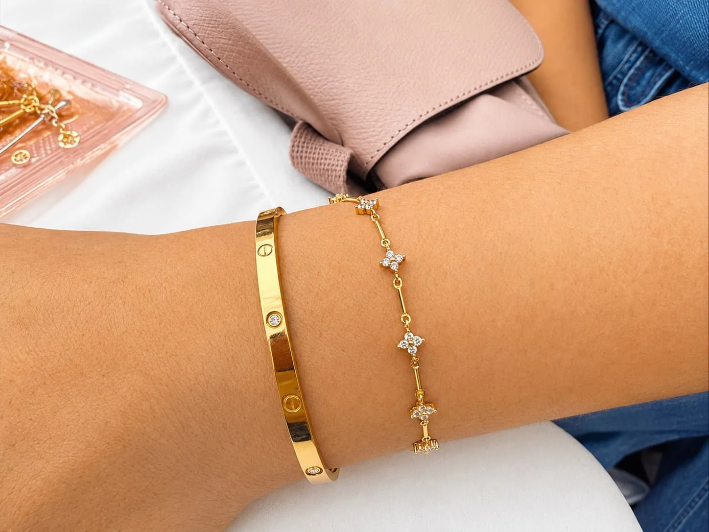 gold-bracelet-stack-on-customer-wrist.jpg