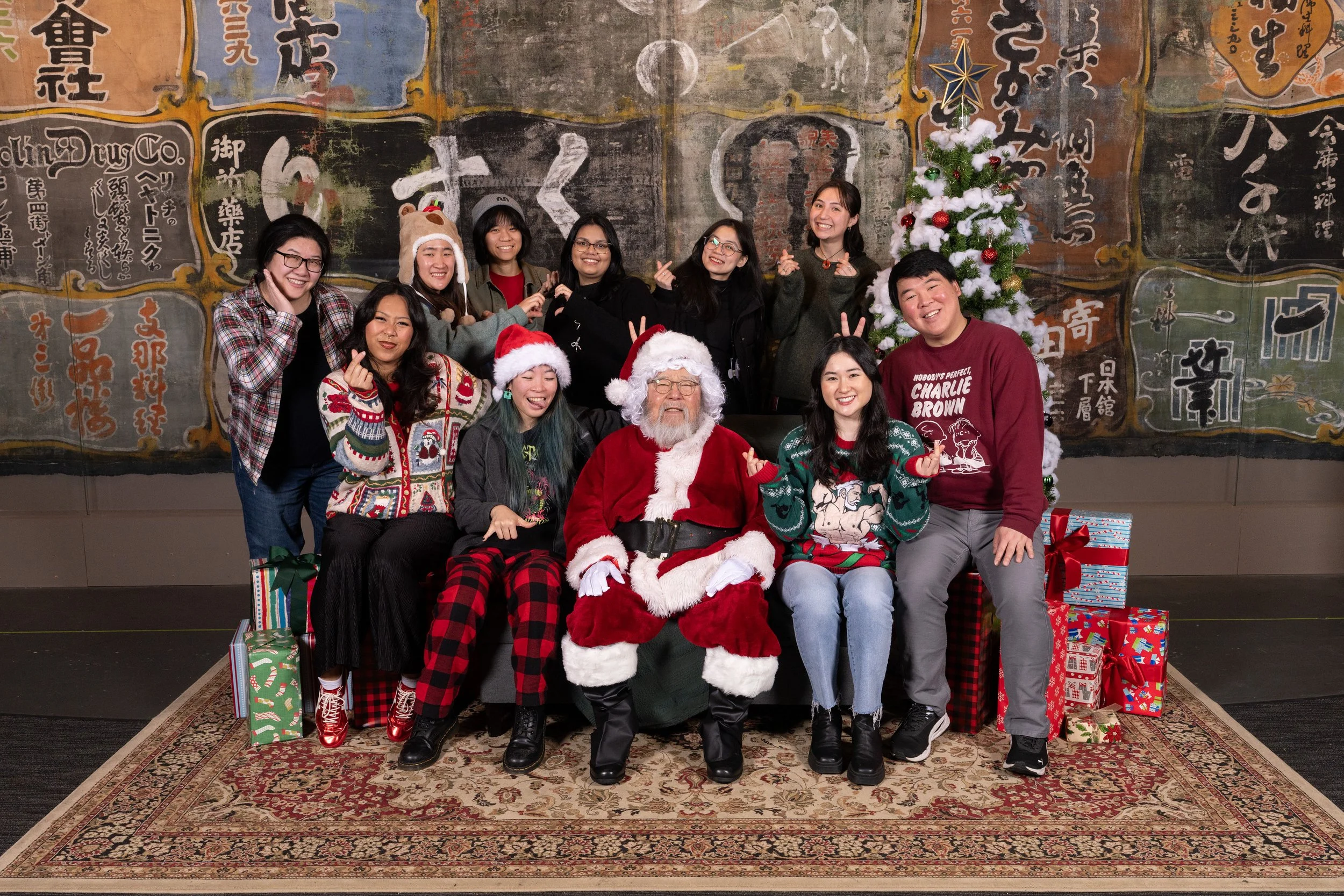 SAAFF staff pictured with Wing Luke Museum’s Asian Santa during our annual holiday tradition.