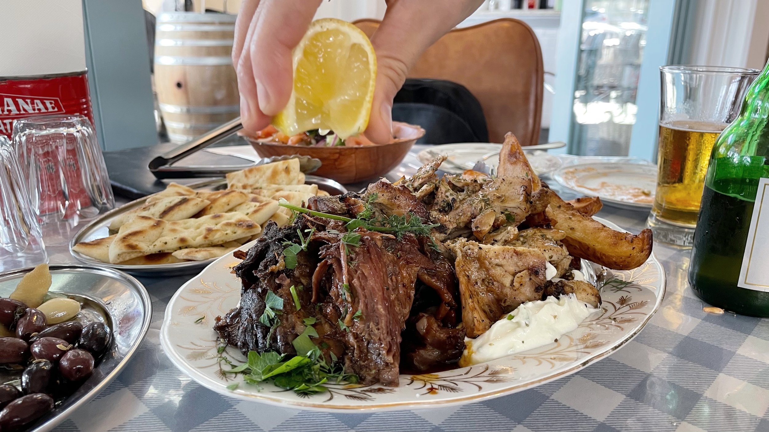 Slow-roasted lamb shoulder on tzatziki at Vasili's Table, West Beach