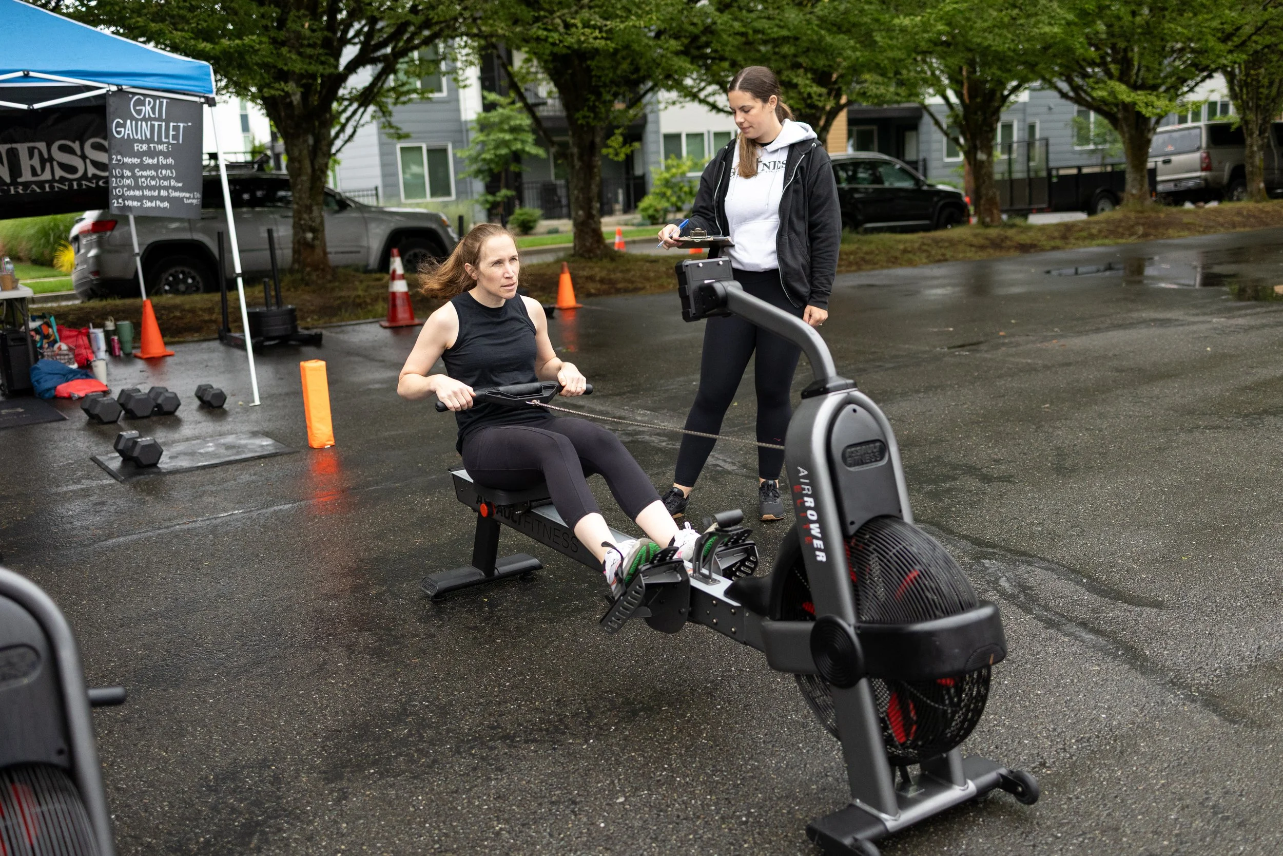 A woman using a rowing exercise machine. South Kitsap's Fitness gym equipment for Samson Fest