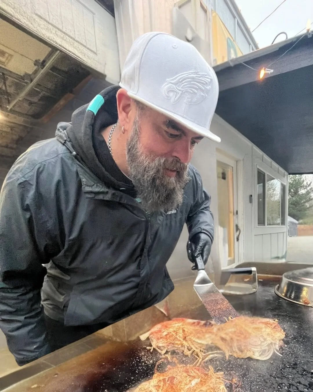 Dan with Elevated Eats making the fan favorite - smash burgers in Port Orchard