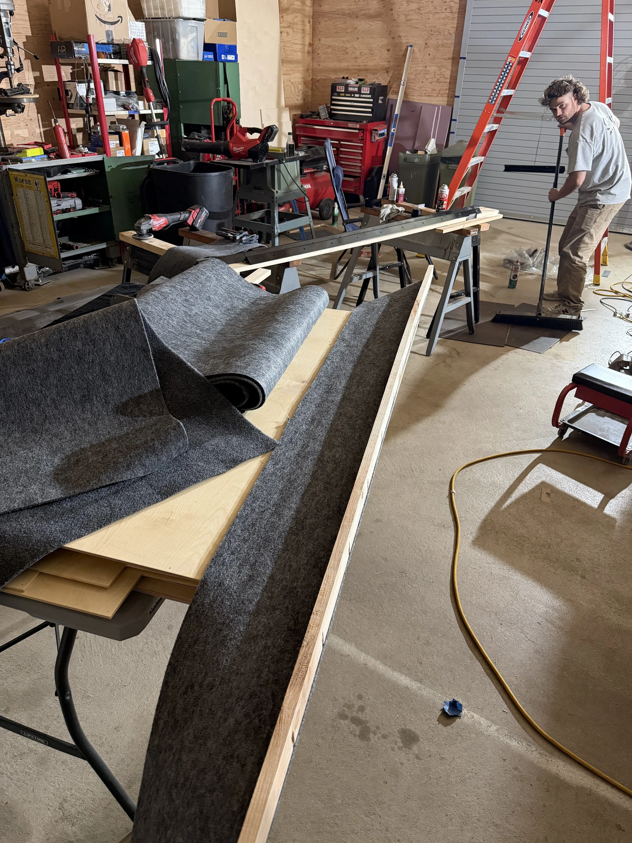 Made a lip to go on the shelves to hold tools and material on the shelves during travel