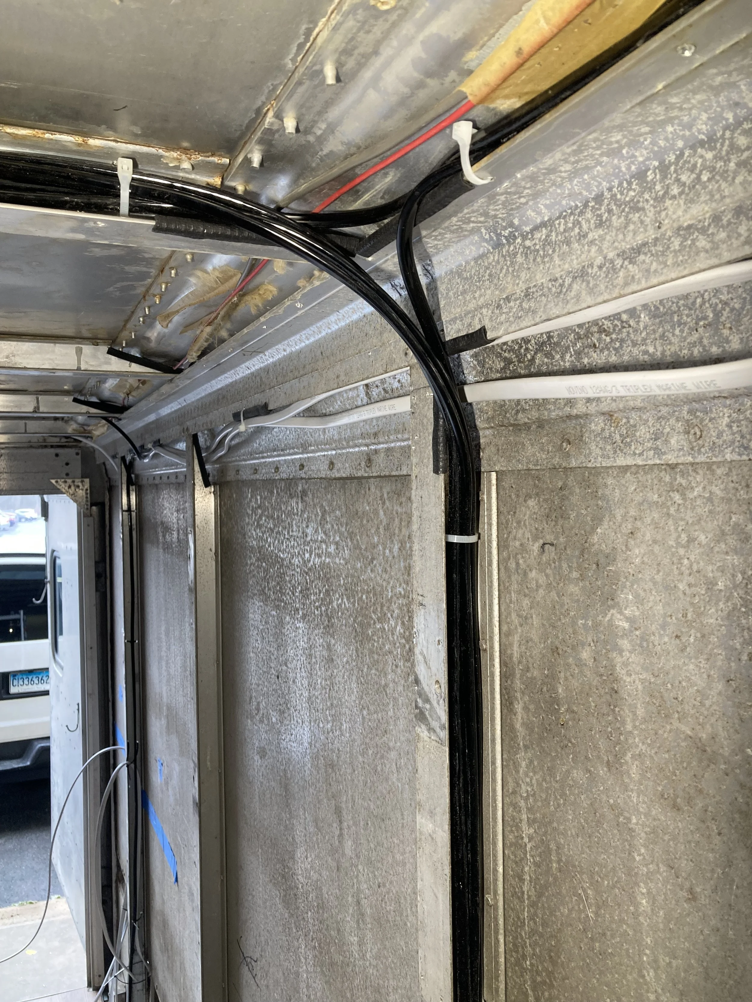Used marine grade wire and installed rubber edging where it passed over metal edges