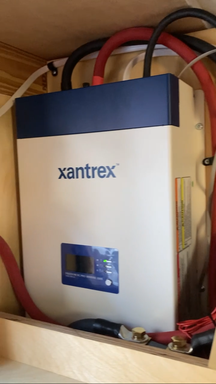 Installed the Xantrex Freedom XC Marine 3000w Inverter/Charger. With this you are able to charge your house batteries from shore power as well as convert your 12v DC power to 120v AC power. 